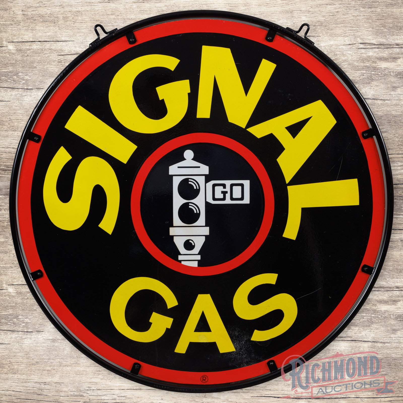Signal Gas 45" Double Sided Porcelain Sign w/ Ring "Black Stop Light" Logo: Scarce DSP (double sided porcelain) sign with a metal ring has excellent color and gloss. The display has light wear, fine scratches, and minor color-matched chips with the largest being on the "A" of