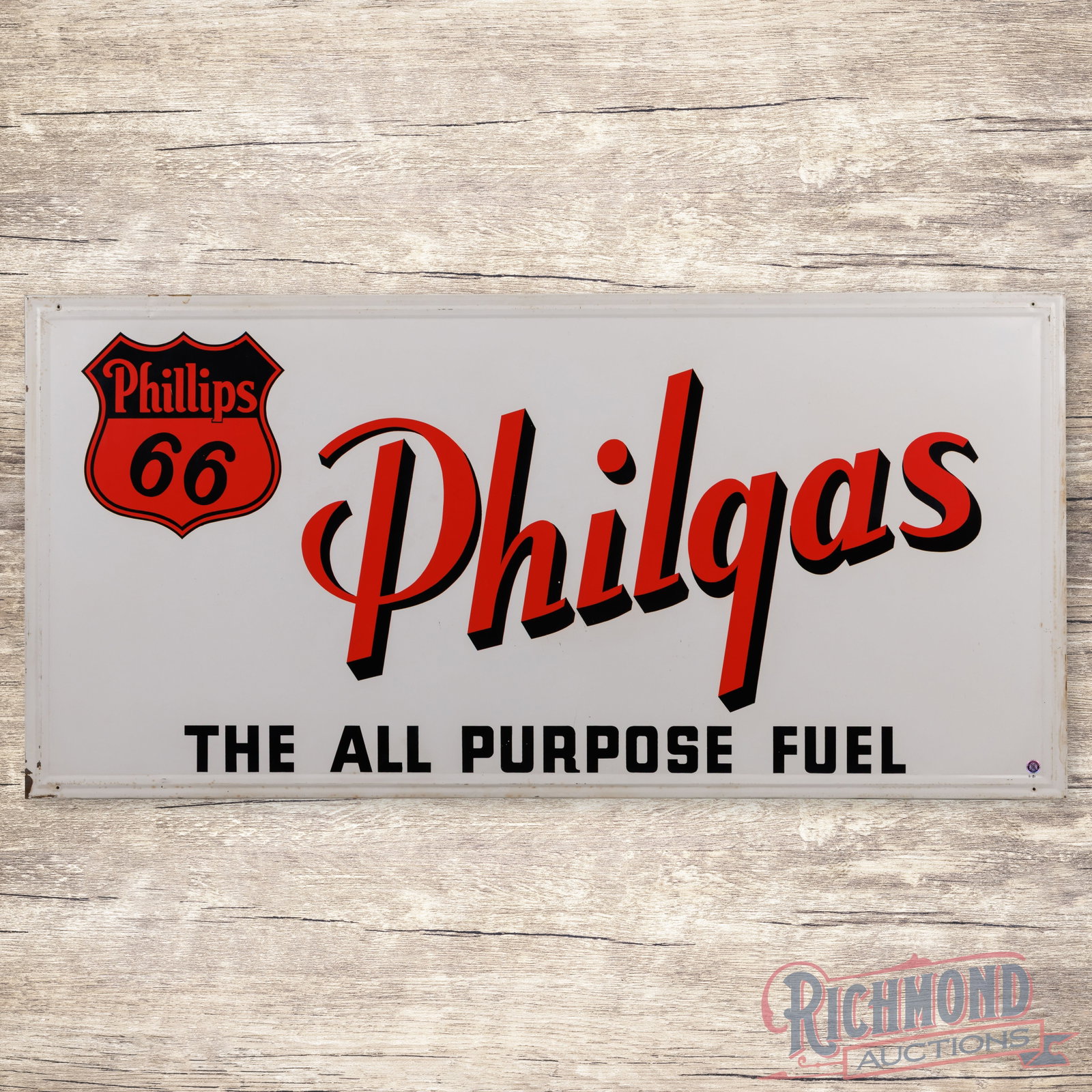 Phillips 66 Philgas "The All Purpose Fuel" Emb. Single Sided Tin Sign w/ Logo: SST (single sided tin) self-framed sign with the factory wooden support frame has very good color and shine. The display has light wear, minor fine scratches and a tiny errant paint drip in the "H" of