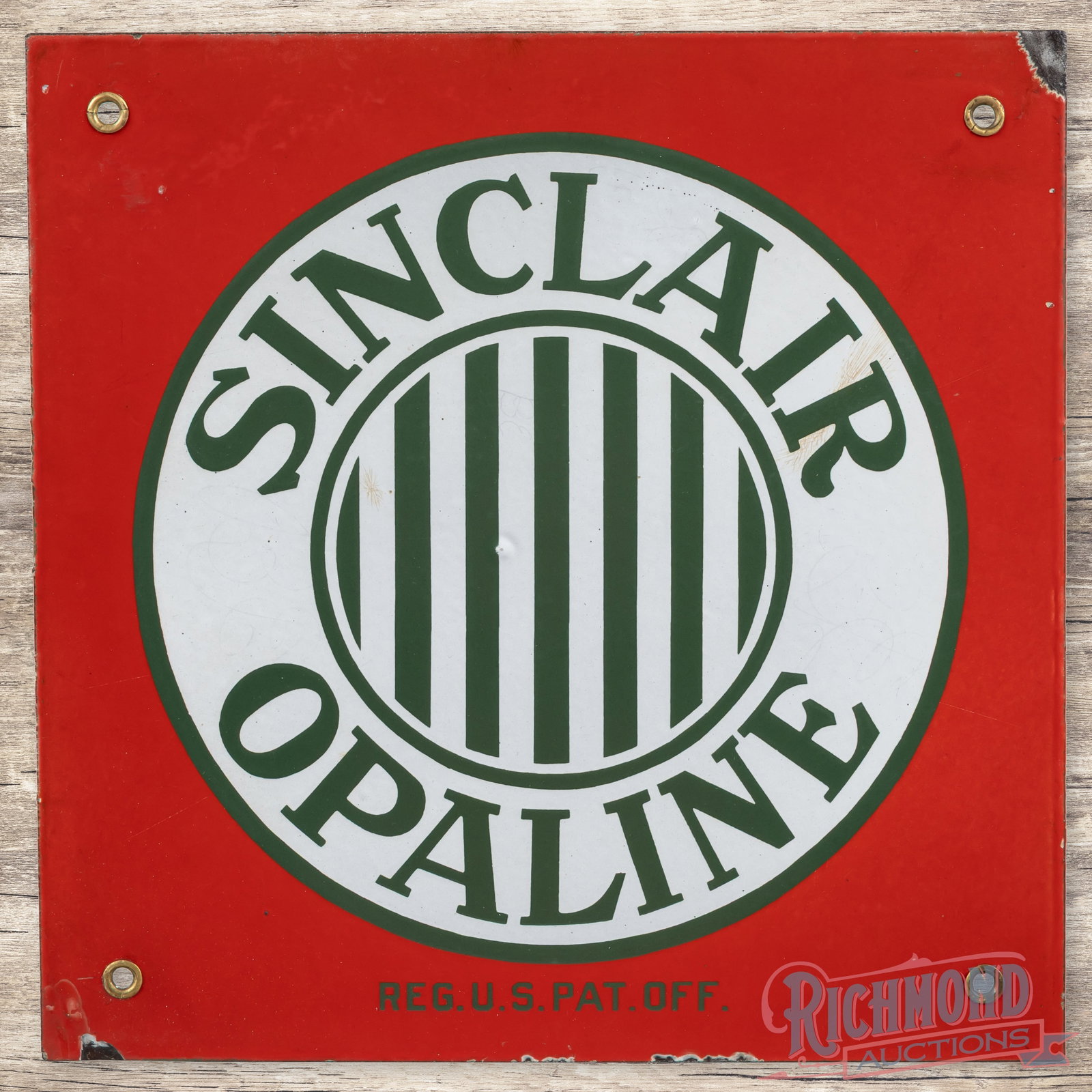 Sinclair Opaline 12" Single Sided Porcelain Sign w/ Striped Logo: SSP (single sided porcelain) sign has very good color and gloss. The display has light wear with bruises in the left and right hand sides of the logo. The red porcelain enamel has slight cloudiness wi