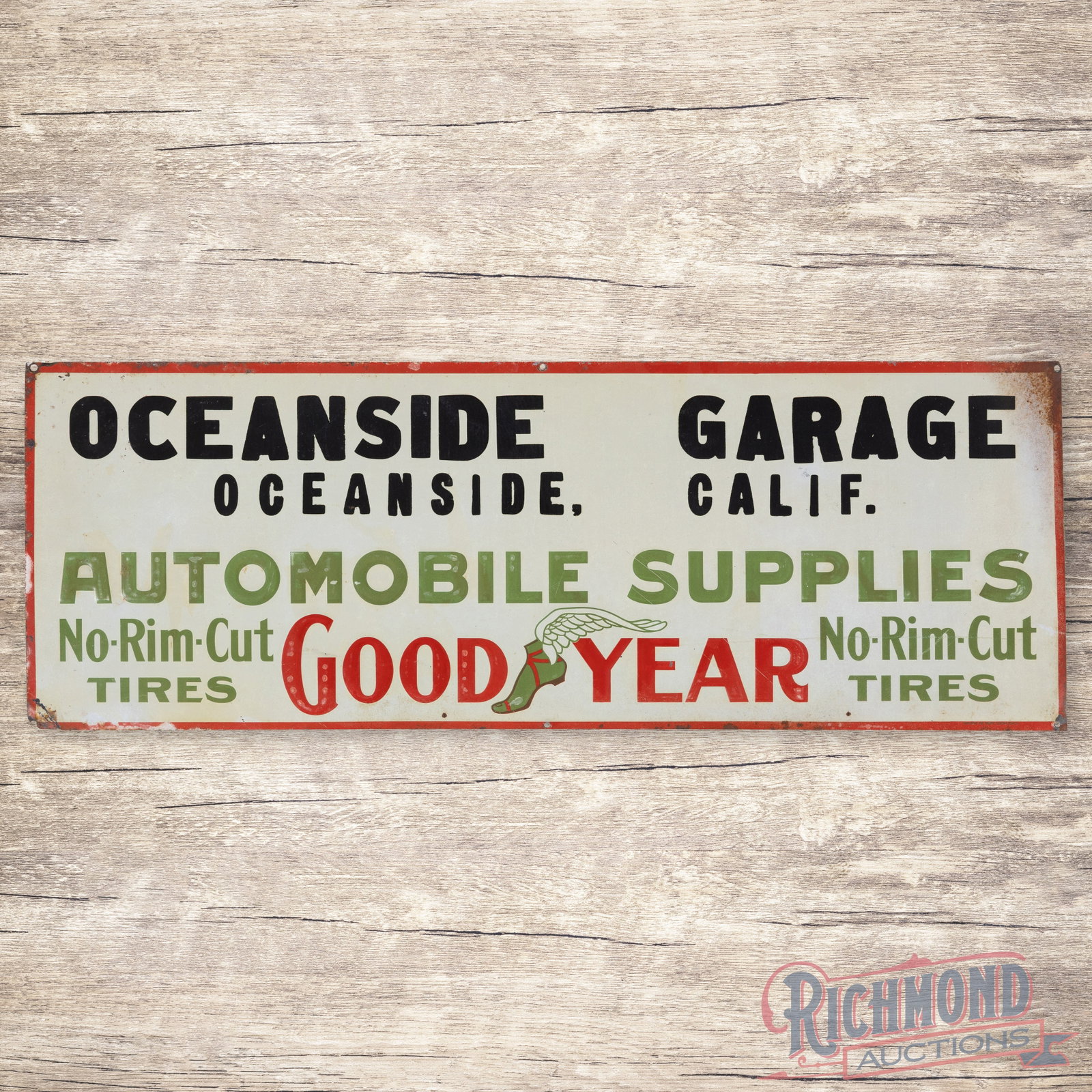 Goodyear Automobile Supplies Oceanside Garage California Single Sided Tin Sign: SST (single sided tin) sign has very good color and shine. The sign exhibits age toning throughout with small scratches and light wear in the field. The perimeter has areas of fading, discoloration, o