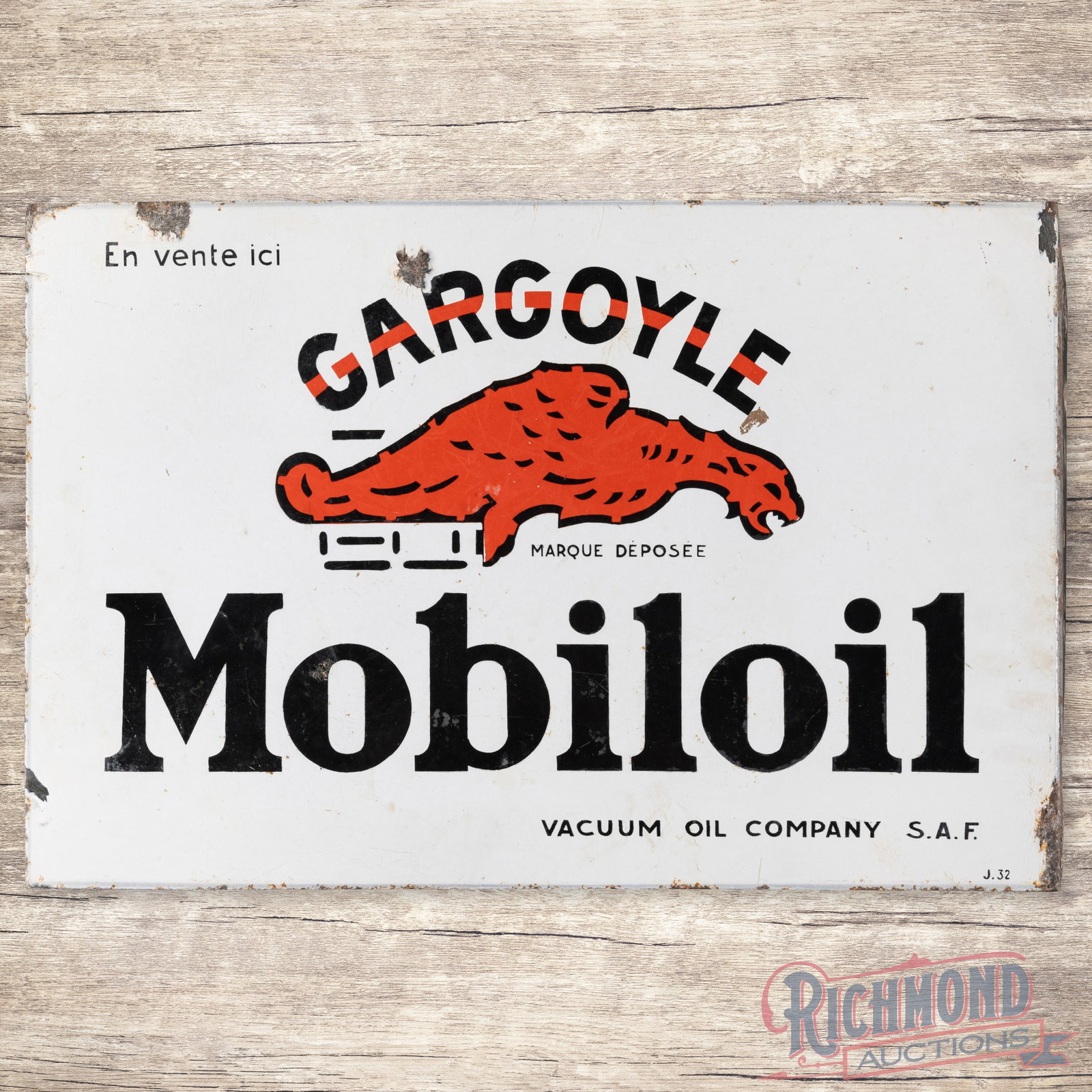 Mobiloil Gargoyle Double Sided Porcelain Flange Sign: DSP (double sided porcelain) Sign has good color. Both sides exhibit with some chips, areas of fading and crazing. The flange edge has minor bend. Marked J.32 15.5" H X 24" W. Condition: 8 All items a