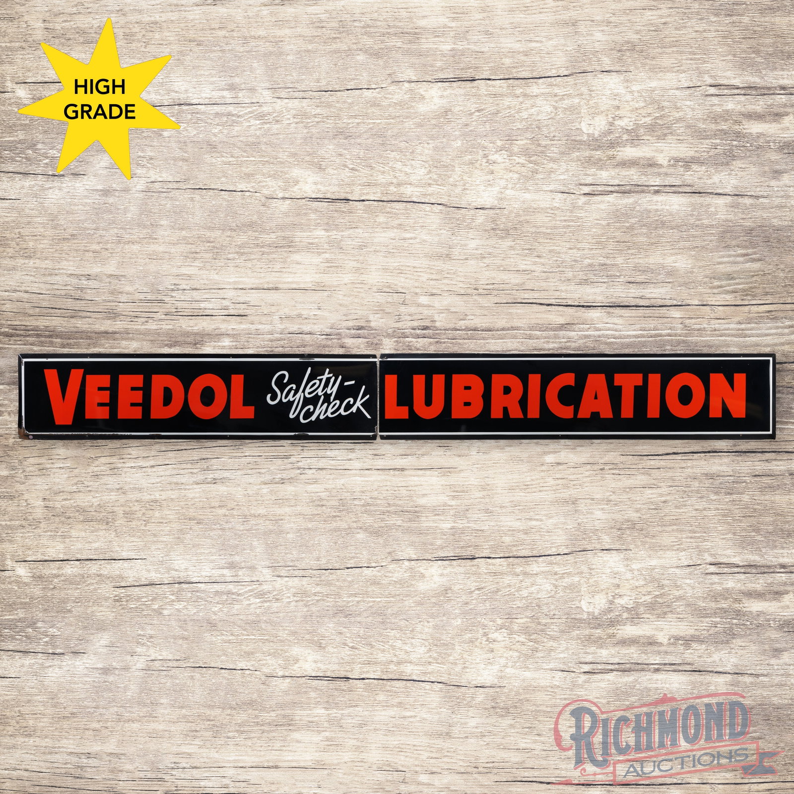 Veedol Safety Check Lubrication 16' Single Sided Porcelain Sign: SSP (single sided porcelain) two-piece sign has excellent color and gloss. The fields are clean with light surface wear in the outer fields. The perimeter has chips with minor edge bends and errant wh