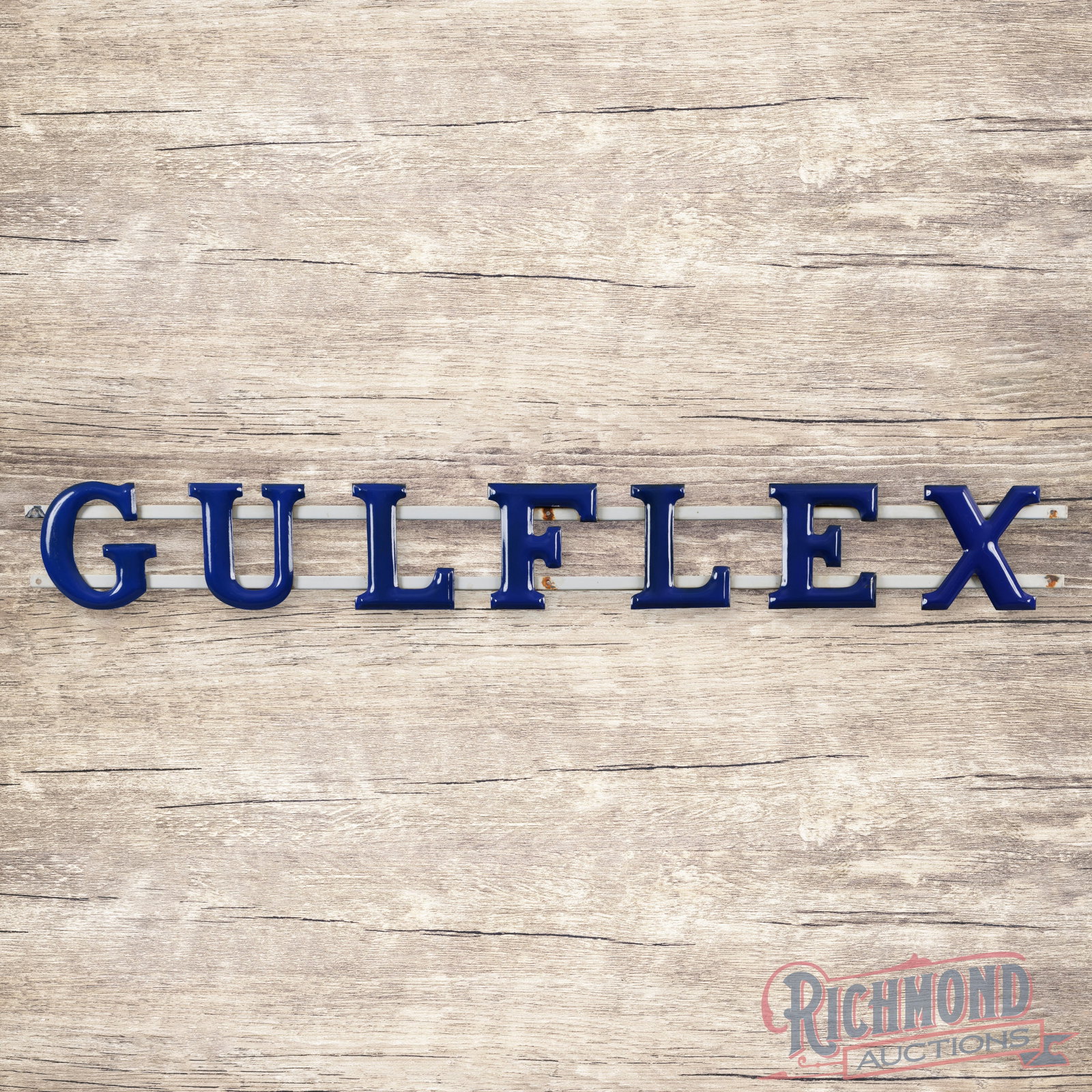 Gulf Gulflex 7' Single Sided Porcelain Letter Sign: SSP (single sided porcelain) convex letter sign with porcelain channel has excellent color and gloss. The letters have light surface wear with tiny chips along the edges. The channel has areas of mino