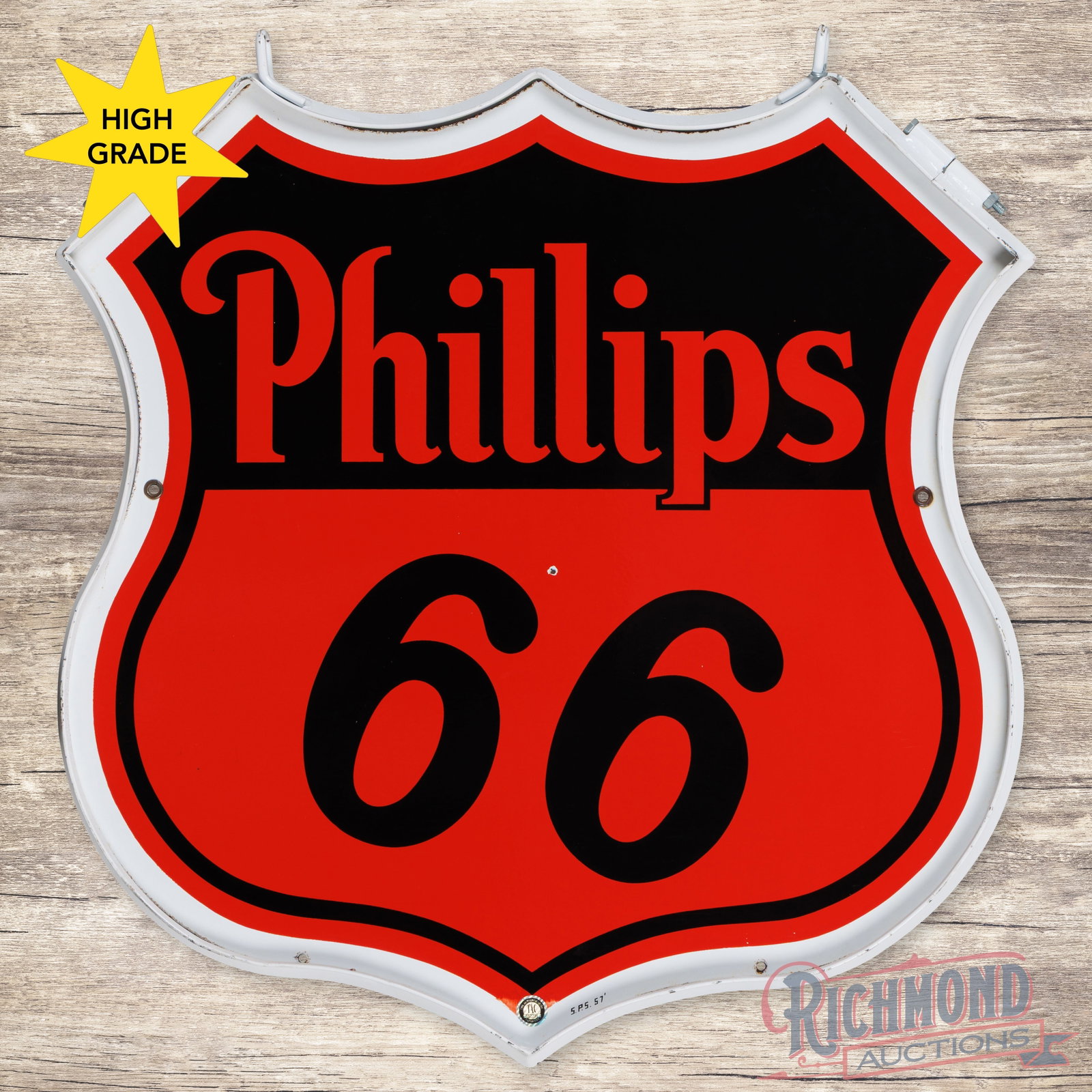 1957 Phillips 66 Double Sided Porcelain 30" Sign w/ Ring "White Border": DSP (double sided porcelain) die cut sign with an added metal ring has excellent color and gloss. The display has a small chip in the field with minor edge wear. The reverse has tiny chips in the uppe