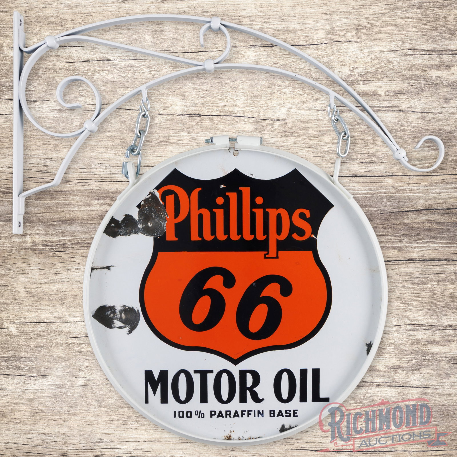 Phillips 66 Motor Oil 20" Double Sided Porcelain Sign w/ Ring & Bracket: DSP (double sided porcelain) sign with an added ring and bracket has very good color and gloss. The display has light wear with large chips in the left field. The perimeter has small bruises and chips