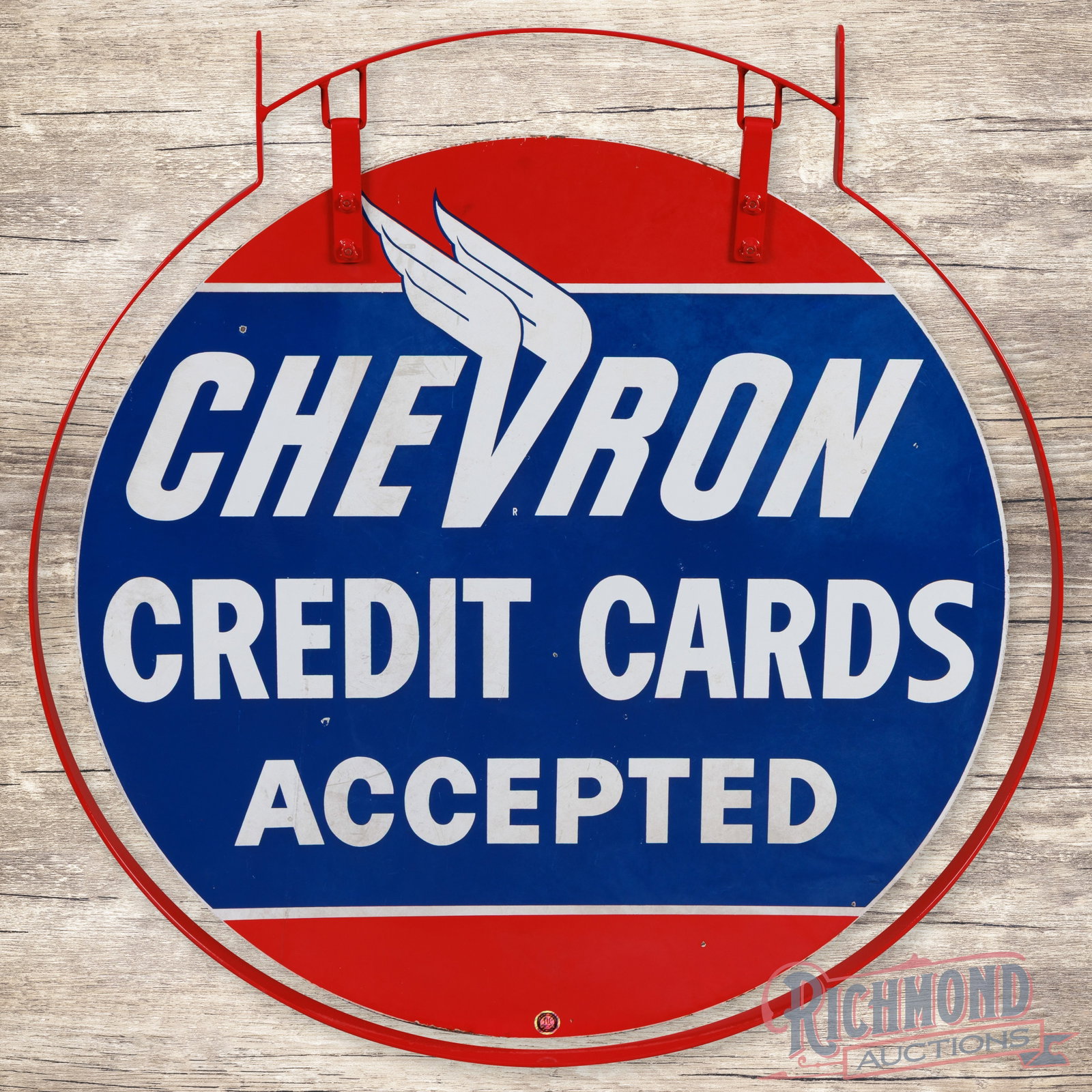 Chevron Credit Cards 33" Double Sided Porcelain Sign w/ Ring: DSP (double sided porcelain) sign with a metal hanging ring has very good color and gloss. The display has light wear with tiny chips and areas of cloudiness in the blue porcelain enamel. The perimete