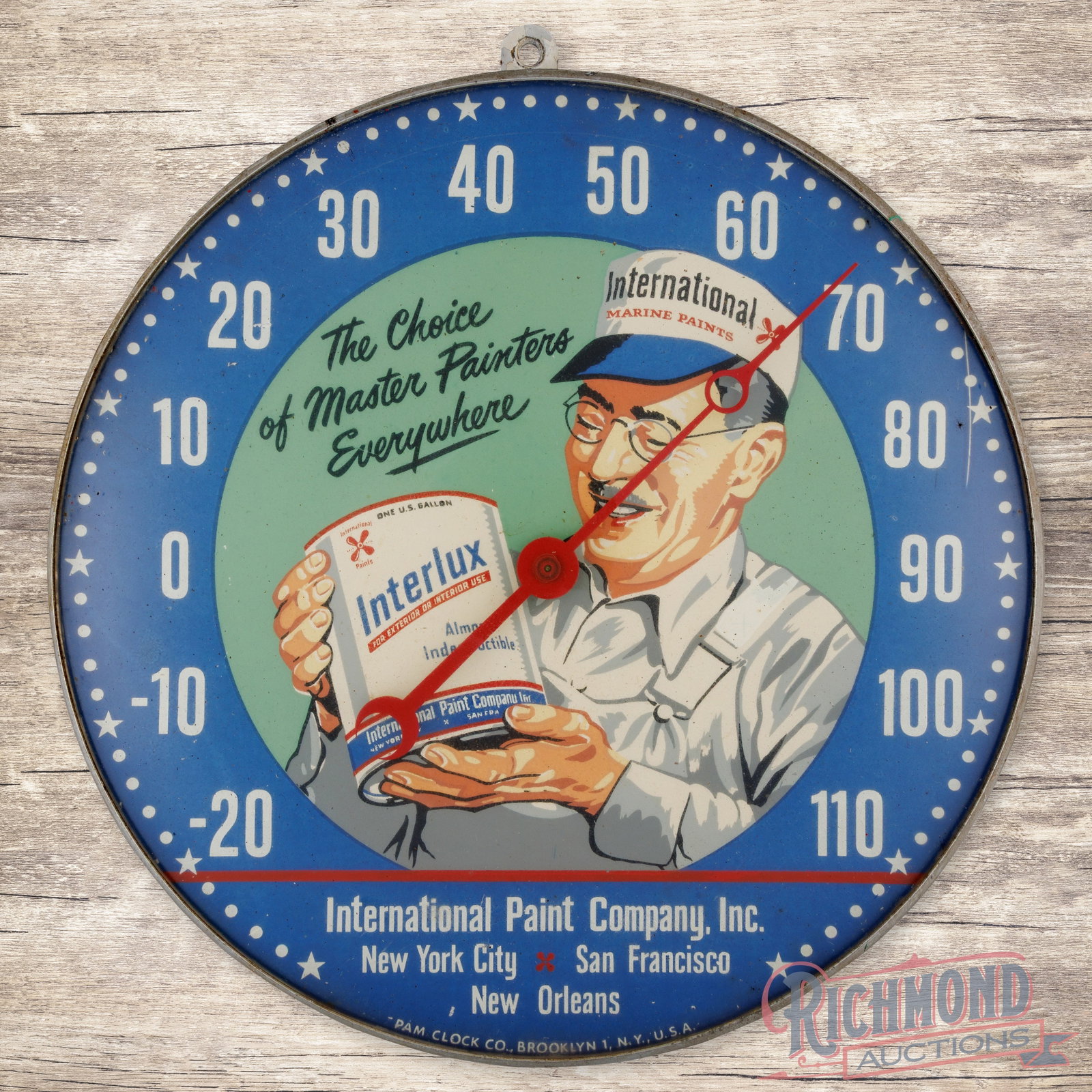Interlux Marine Paints 12" Pam Advertising Thermometer: Pam glass-faced advertising thermometer with a closed back has excellent color. The fields have minor surface imperfections with a factory blemish line near the right edge at 2 o'clock. The metal can 