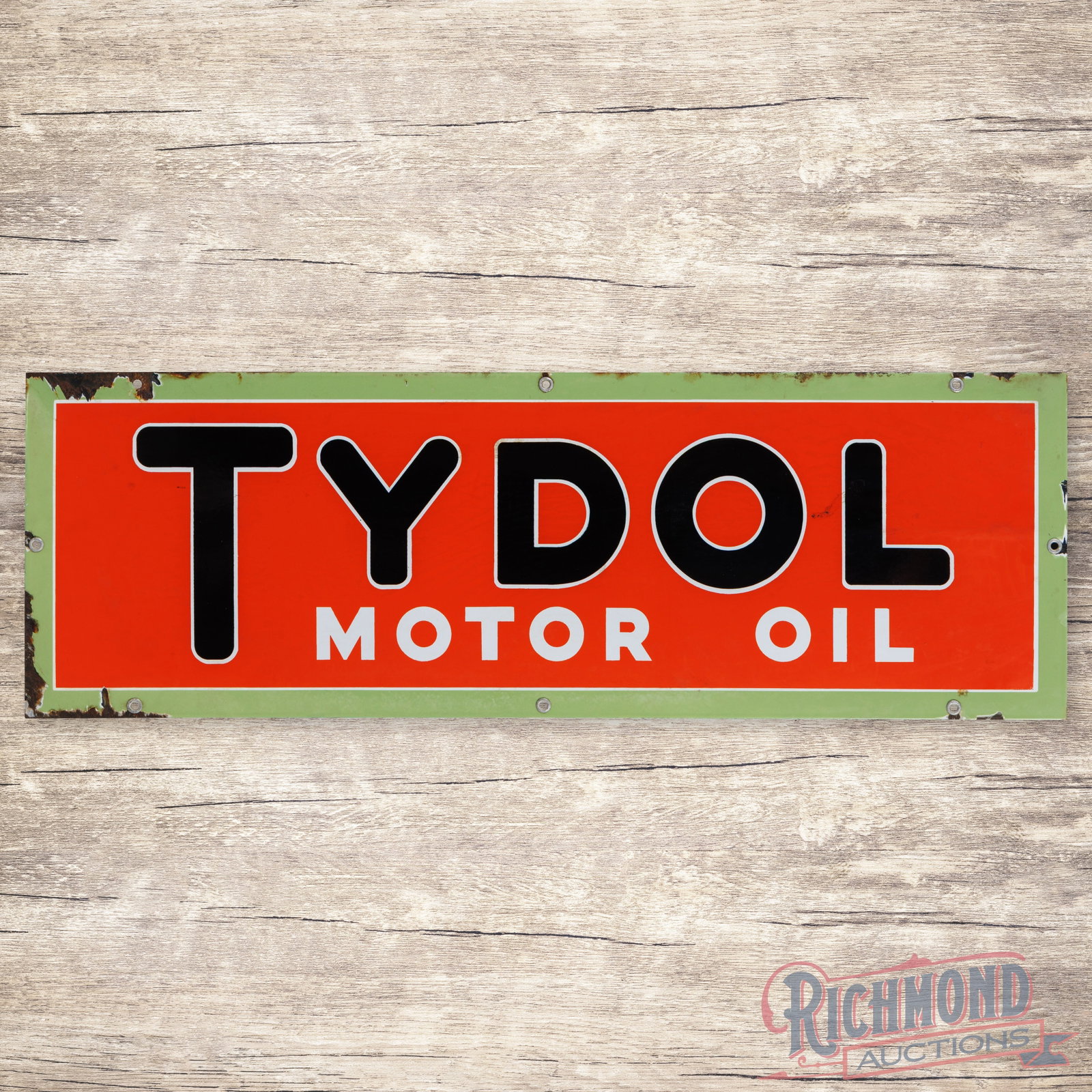 Tydol Motor Oil 42" Single Sided Porcelain Sign: SSP (single sided porcelain) sign has very good color and gloss. The field is clean with areas of discoloration to the orange porcelain enamel. The perimeter has chips with areas of cloudiness and dis