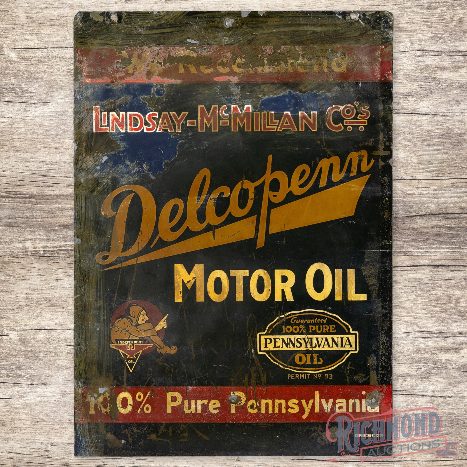 We Recommend Lindsay McMillan Delco Penn Motor Oil Double Sided Tin Sign w/ Elf & Independent Logo: DST (double sided tin) sign has good color and moderate shine. The display has general wear with scratches, paint chips and bends. The perimeter has areas of paint loss with non-factory holes. The rev