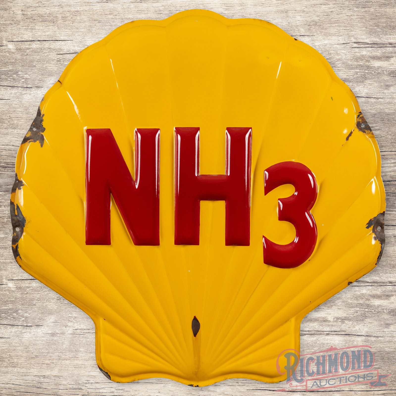 Rare Shell NH3 Fertilizer 36" Single Sided Porcelain Convex Sign: SSP (single sided porcelain) convex die cut sign has excellent color and gloss. The display has a chip in the lower field with additional chips and small bends along the outer edges. Overall a tough-t