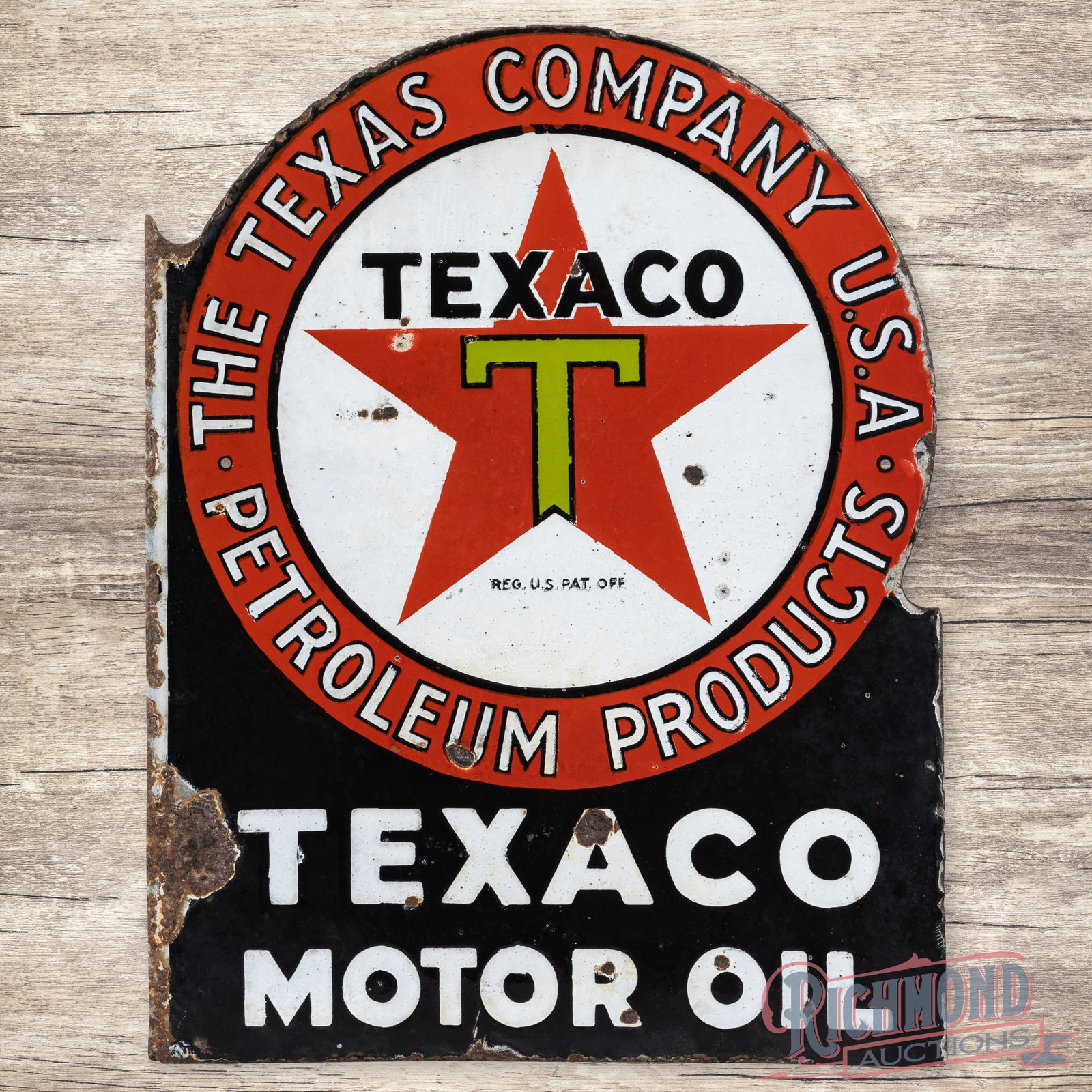 Texaco Motor Oil The Texas Company Double Sided Porcelain Flange Sign: DSP (double sided porcelain) flange has good color and gloss. The display has general wear with discoloration, chips, and crazing. The perimeter has edge wear with large chips along the inner flange. 