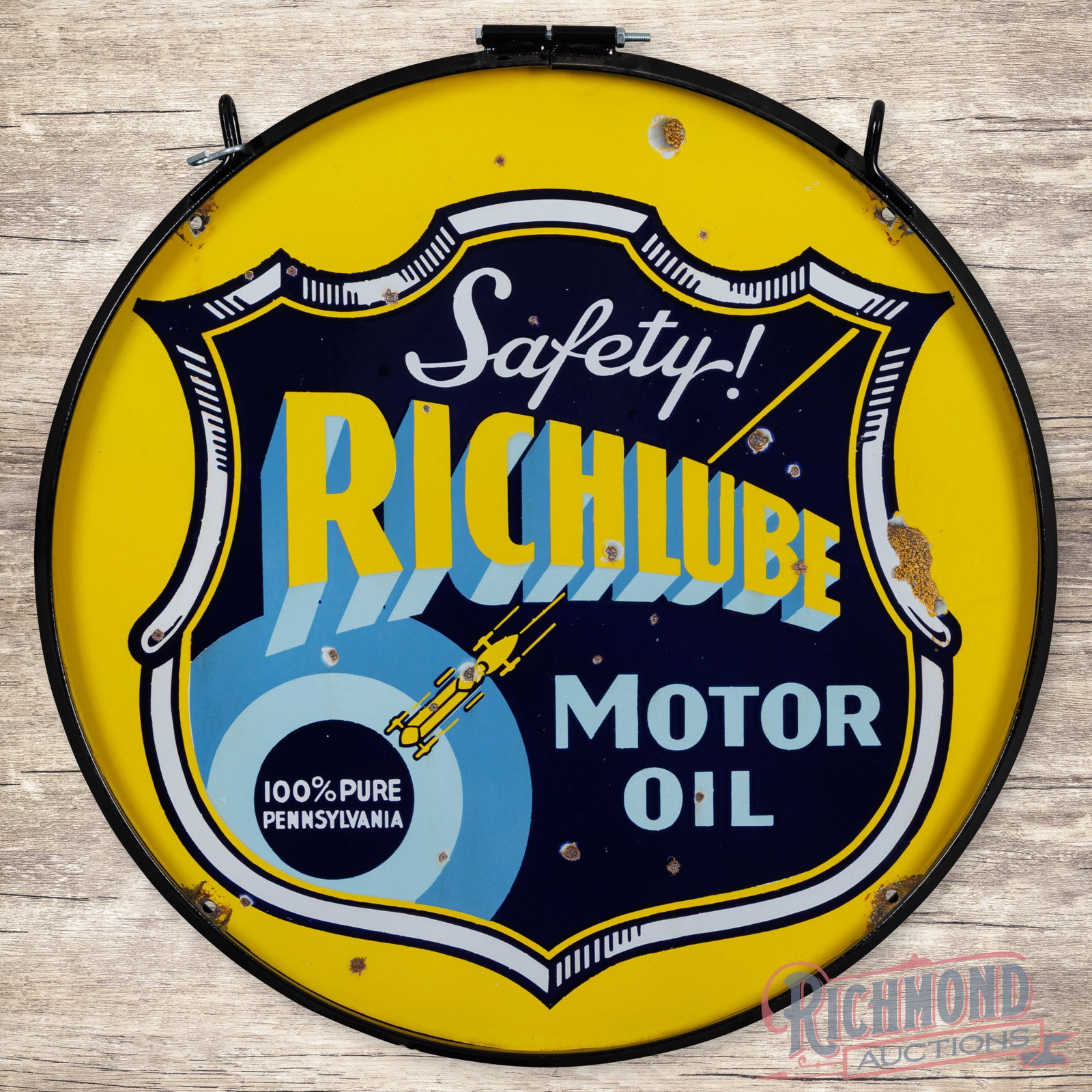 Safety! Richlube Motor Oil 24" Double Sided Porcelain Sign w/ Ring & Race Car: DSP (double sided porcelain) sign with a metal ring has very good color and gloss. The display has light wear with chips in the fields and along the perimeter. The reverse is in a similar condition. T