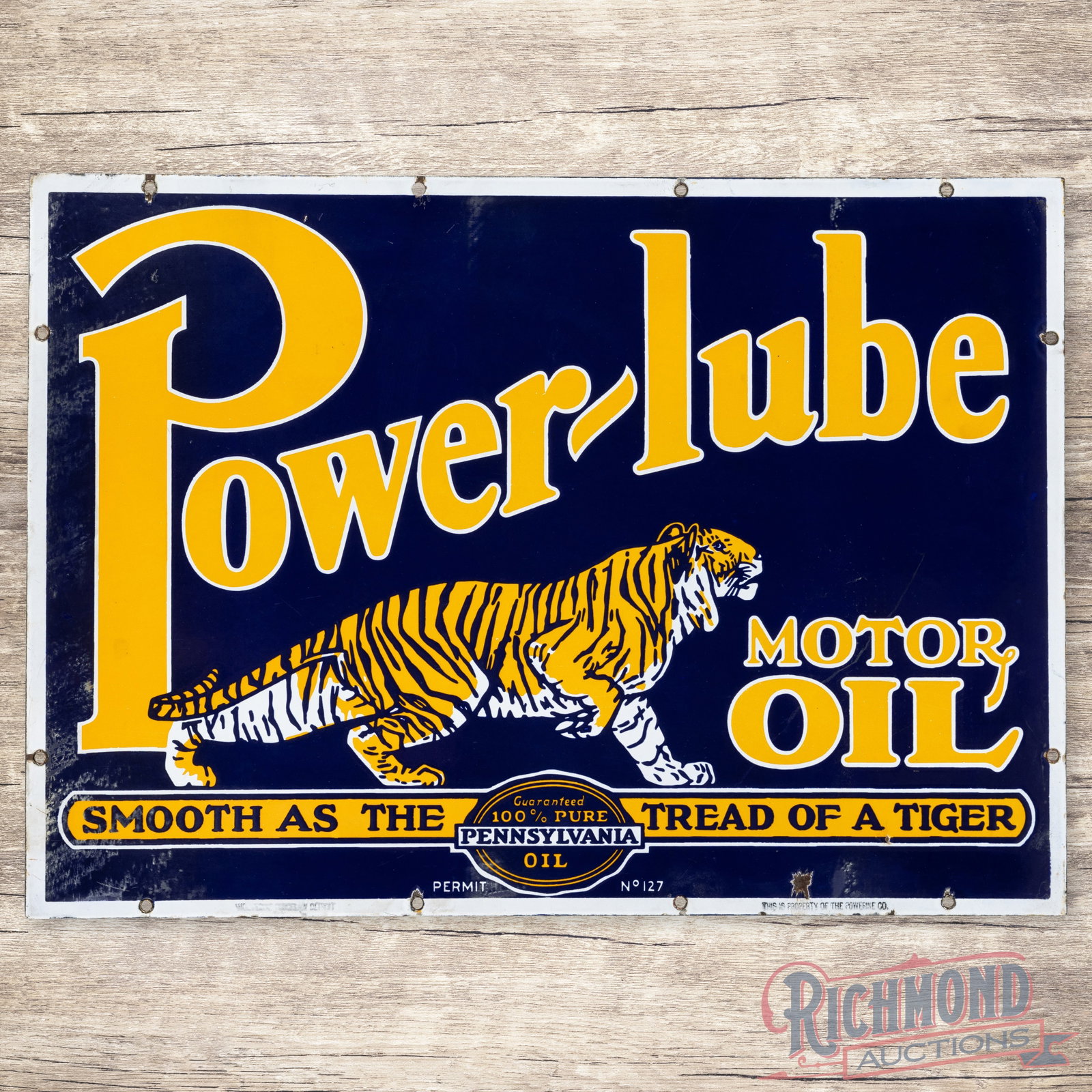 Powerlube Motor Oil "Smooth as the Tread of a Tiger" Double Sided Porcelain Sign: Iconic DSP (double sided porcelain) sign has excellent color and gloss. Side #1 has a clean field with areas of cloudiness and small chips along the perimeter. The reverse has surface wear and cloudin