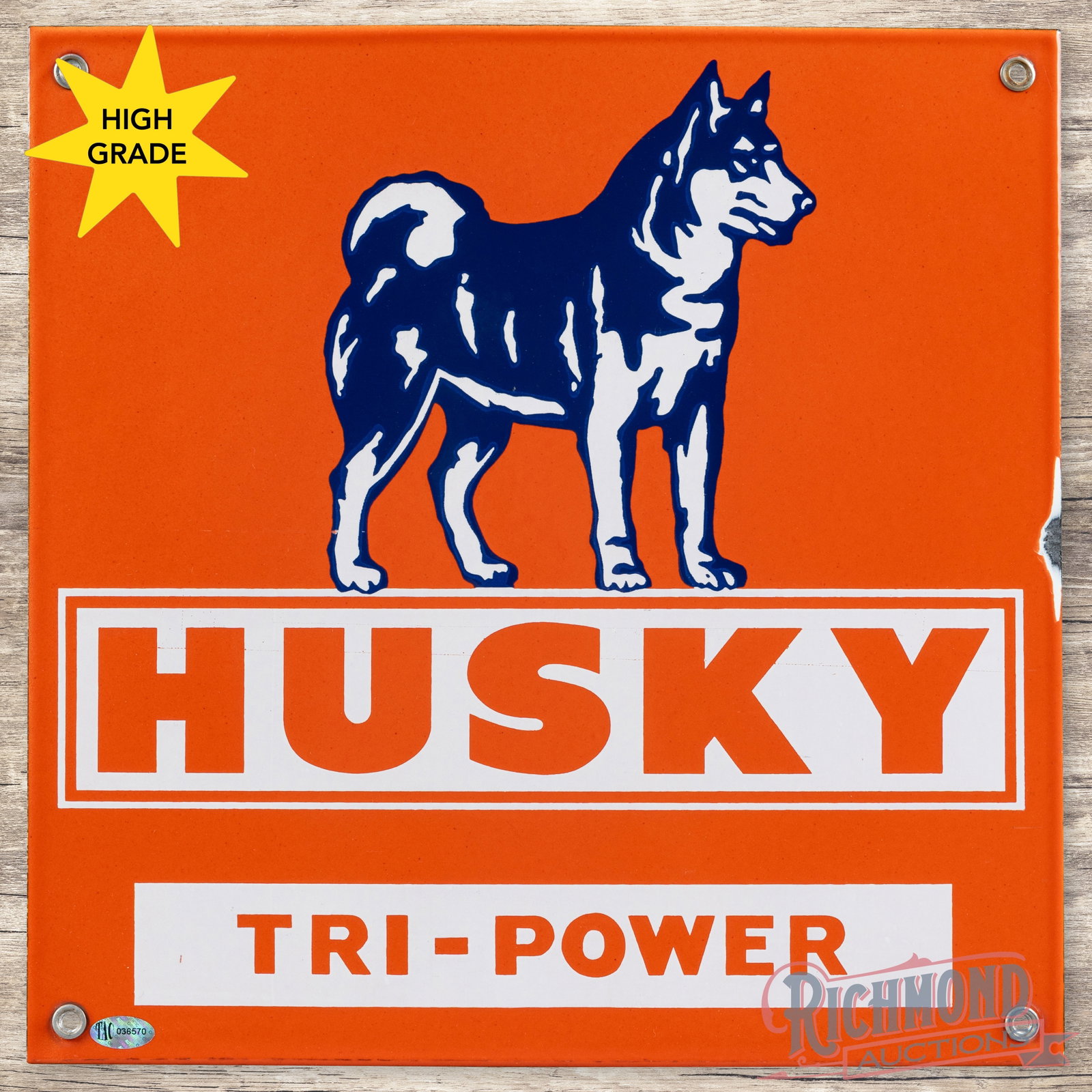Husky Tri-Power Gasoline Single Sided Porcelain Pump Plate Sign: SSP (single sided porcelain) pump sign has day one color and gloss. The display has a fine scratch in the left field with a chip on the outer right-hand edge. All four factory grommets are present. Th