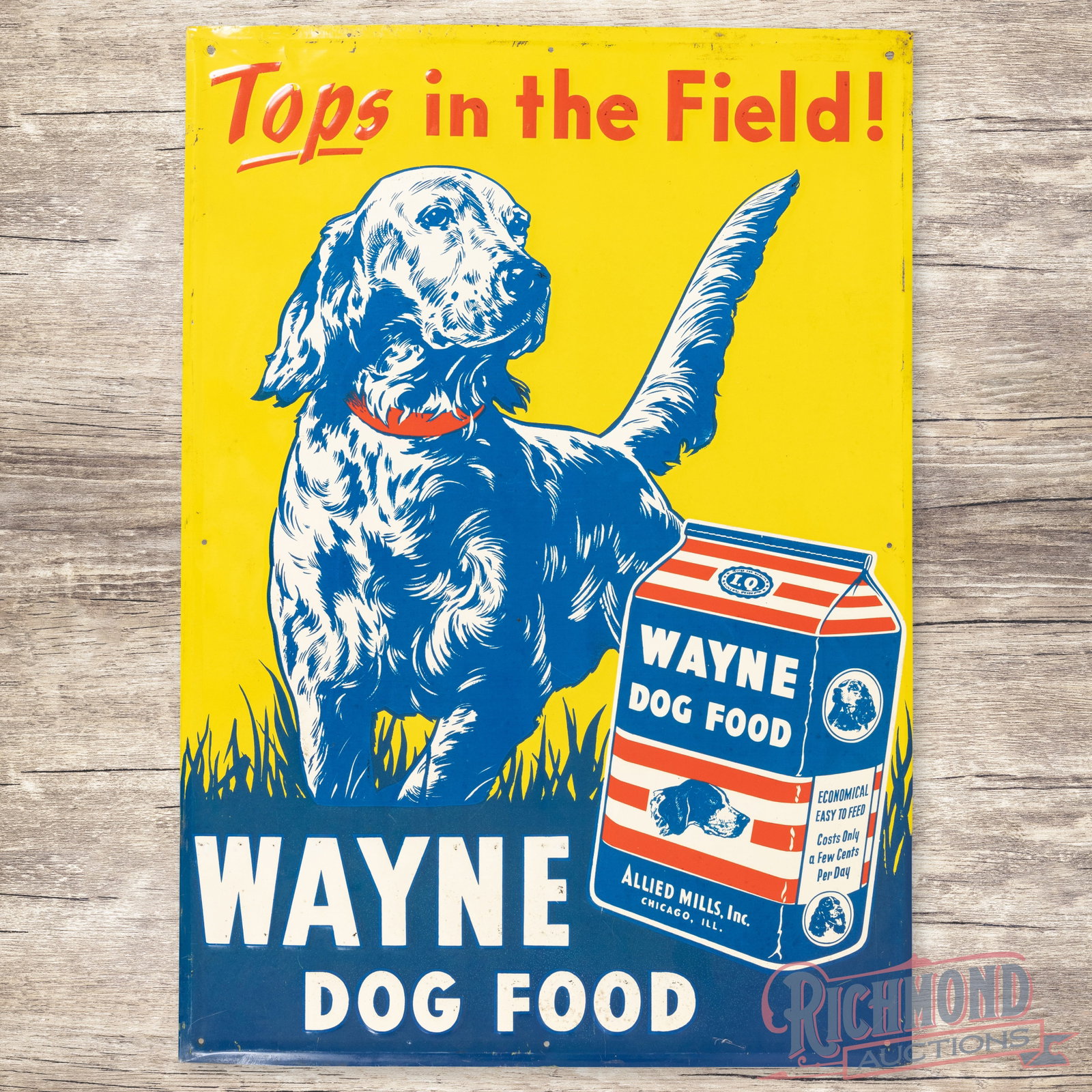 Wayne Dog Food "Tops in the Field" Emb. Single Sided Tin Sign: SST (single sided tin) embossed self-framed sign has very good color and shine. The field has light wear with small scuffs in the lettering. The perimeter has bends with surface wear and minor discolo