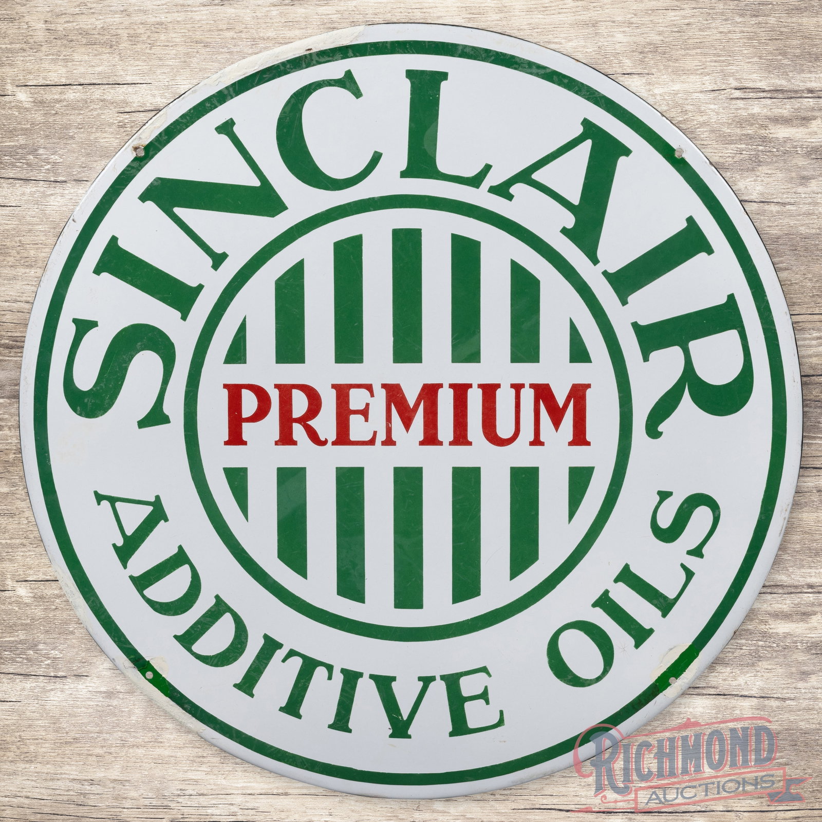 Rare Sinclair Premium Additive Oils 30" Single Sided Porcelain Sign w/ Striped Logo: Amazing SSP (single sided porcelain) rolled-edge sign has good color and gloss. The field has light surface wear with faint cloudiness throughout. The lower right outer field has a bruise between the 