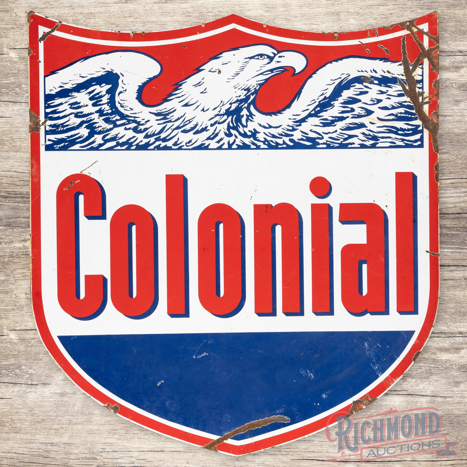Colonial Gasoline 6' Double Sided Porcelain ID Sign w/ Eagle: DSP (double sided porcelain) shield-shaped sign has good color and gloss. The display has surface wear with marks, chips and cloudiness in the lower fields. The outer fields and perimeter have large c