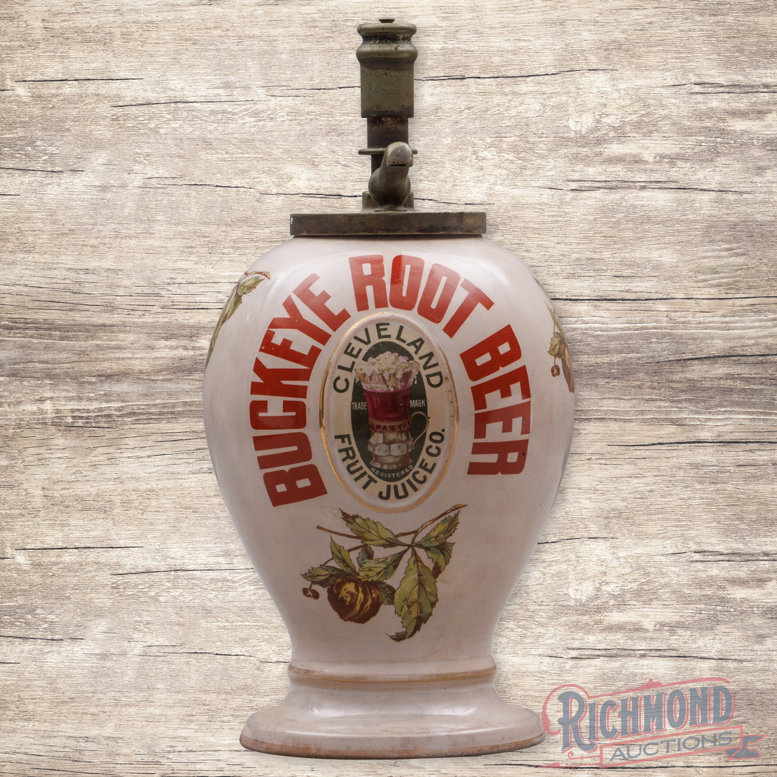 Buckeye Root Beer Ironstone Soda Fountain Syrup Dispenser Cleveland Fruit Juice Co.: Ironstone syrup dispenser presents with excellent color and the original Cleveland Fruit Juice Company marked dispenser. The display has a clean field with minor surface imperfections. The reverse has
