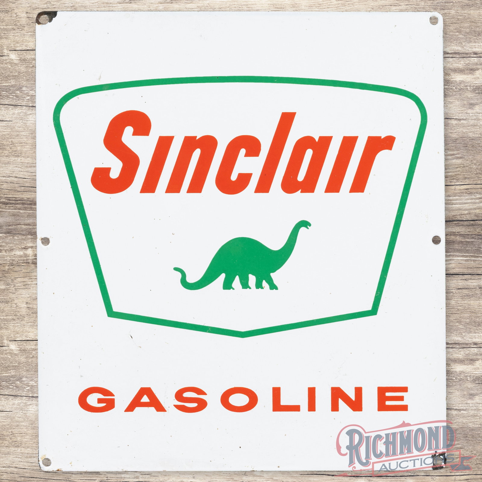 Sinclair Gasoline Single Sided Porcelain Pump Plate Sign w/ Dino: SSP (single sided porcelain) sign has excellent color and gloss. The display has light wear with a tiny line chip in the white above the "A" in Gasoline. The perimeter has chips at the corners. The si