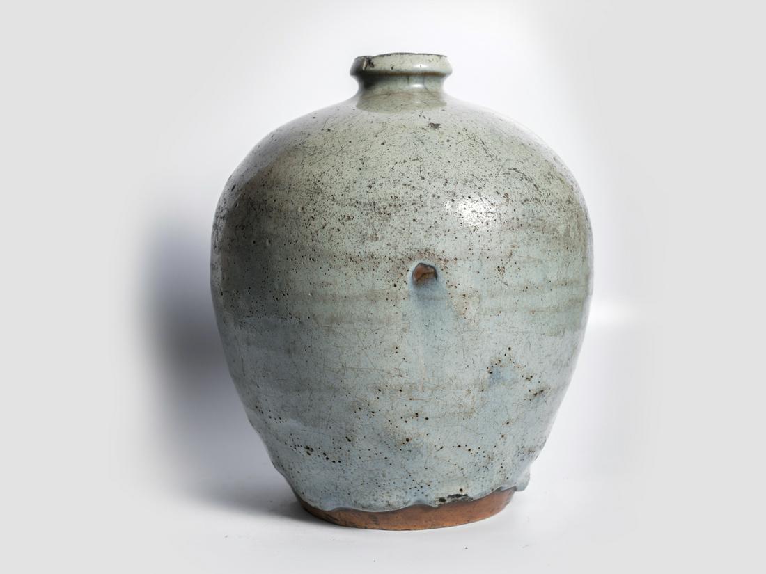 Jun glaze ceramic bottle, China (Henan): Jun glaze ceramic bottle China (Henan) Song to early Ming dynasty (968 - ca. 15th century) Height 23 cm, diameter 18 cm Wine bottle with pale green Jun glaze The characteristic lavender-blue color exh