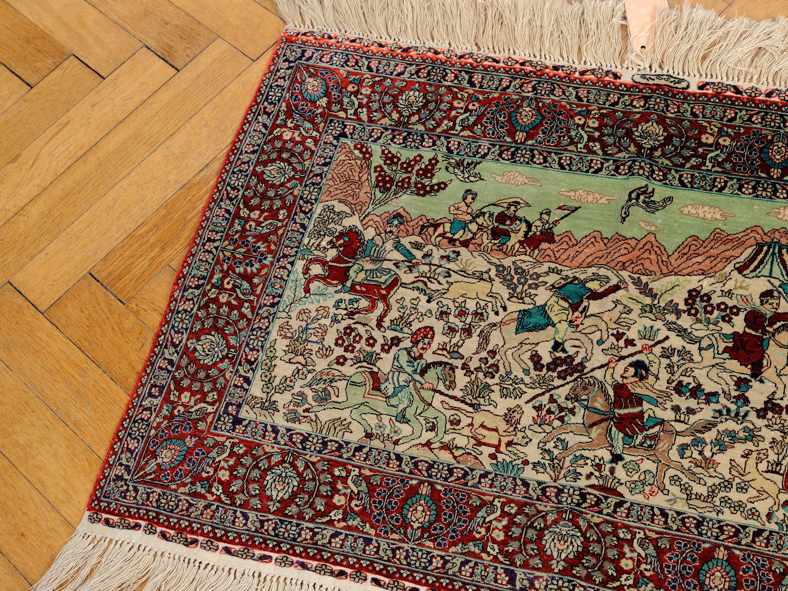 Small carpet with hunting scenes (1 of 3)