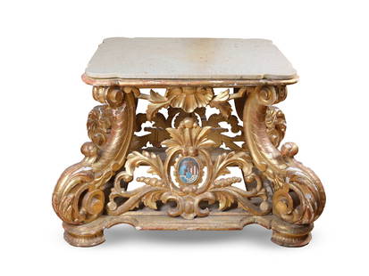 Point table, Southern Germany or Italy: Point tableSouthern Germany or ItalyMid 18th centuryCarved and gilded wood with coat of armsHeight 70 cm, width 100 cm, depth 85 cm