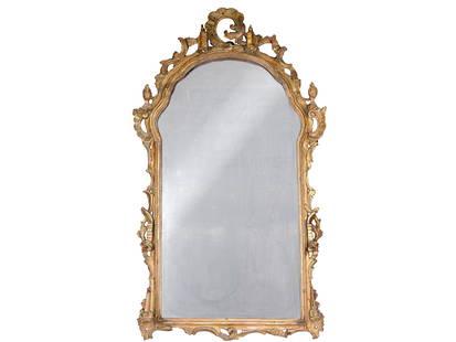 Venetian baroque mirror, Around 1760: Venetian baroque mirrorAround 1760Carved and gilded woodHeight 133 cm, width 72 cmProvenance: Laudon Castle