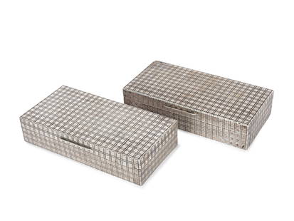 Pair of cigarette or cigar boxes, 1910/20: Pair of cigarette or cigar boxes1910/20Wooden core marked with silver coatingHallmarked 800 and unclear official hallmarkLength 18, 5 cm, depth 9 cm, height 4 cmTotal weight 495g