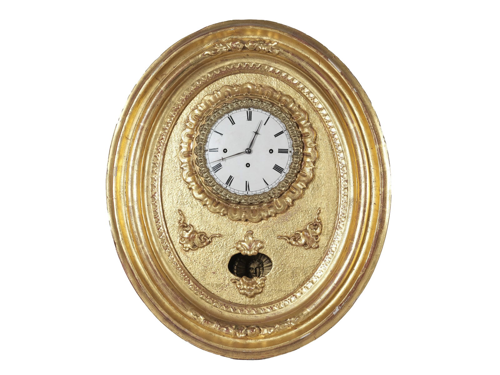 OVAL WALL CLOCK, MID-19TH CENTURY: Oval wall clockMid-19th centuryWood and gold-platedViennese four-quarter chimeHeight 50 cm, width 42 cmMovement not proved, no guarantee