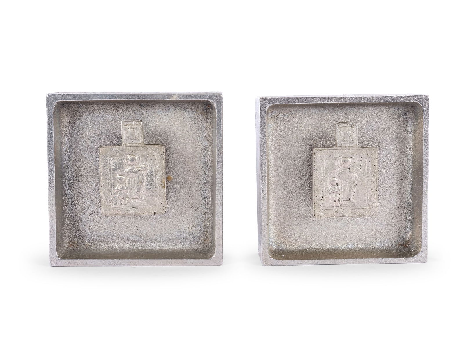 CARL AUBOECK, VIENNA 1900-1957: Carl AuboeckVienna 1900-1957Pair of bronze bookends, nickel-platedVienna, circa 195010.5 x 10.5 cm