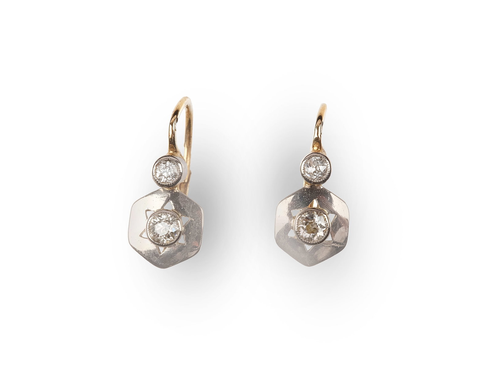 PAIR OF EARRINGS, 14 KT WHITE AND YELLOW GOLD: Pair of earrings 14 kt white and yellow gold With 4 small diamonds Length 1.3 cm Weight 2.8 g Buyer's premium: 18%