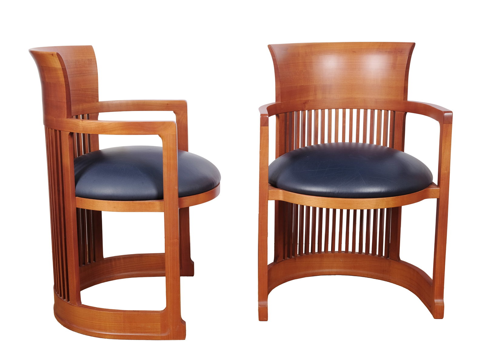 PAIR OF ARMCHAIRS BASED ON A DESIGN BY, FRANK LLOYD WRIGHT (1867 - 1959) (1 of 3)