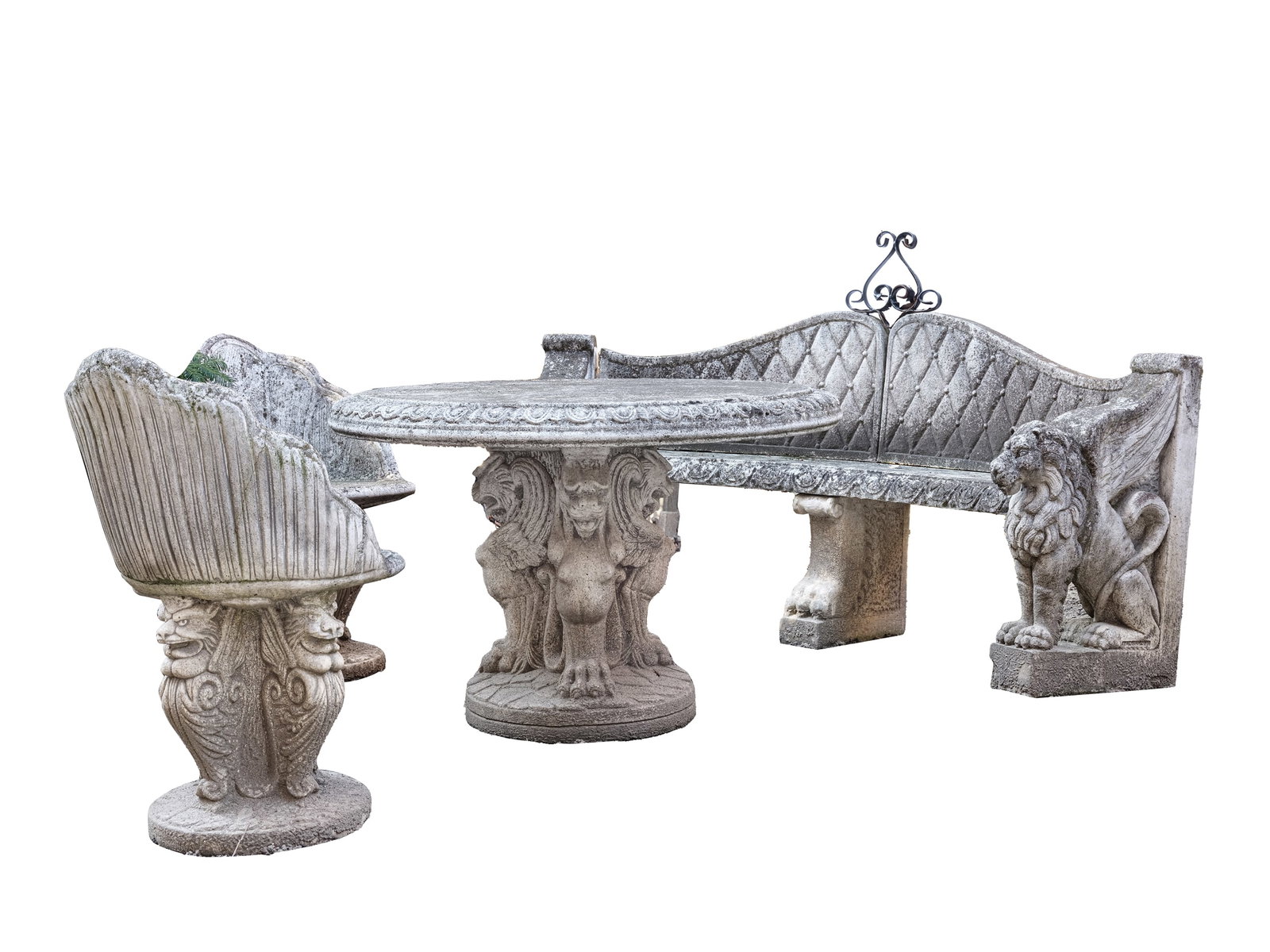 TRAVERTINE STONE GARDEN SET, NOT CAST, CONSISTING OF:: Travertine stone garden set, NOT CASTConsisting of:One bench, two chairs, and one round tableFeaturing sculpted lions and griffinsTable diameter 108 cm, height 71 cmBench length 196 cm, depth 65 cm, h