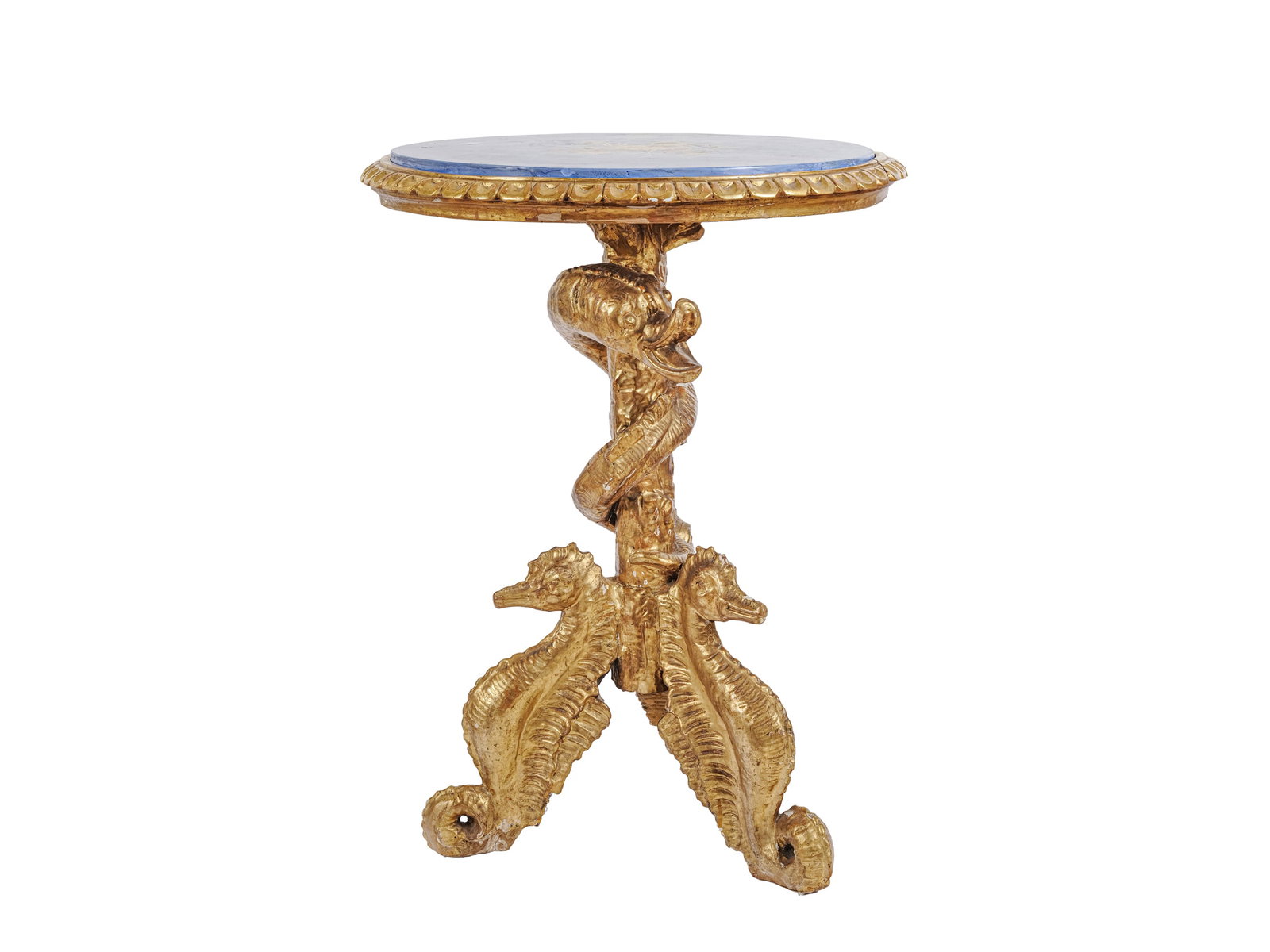 SIDE TABLE, ITALY, 19TH CENTURY: Side tableItaly, 19th centuryBase carved in wood with stylized seahorses and a snake, gildedTop using the scagliola techniqueSea-blue background with shell decorationDiameter of marble top: 54.5