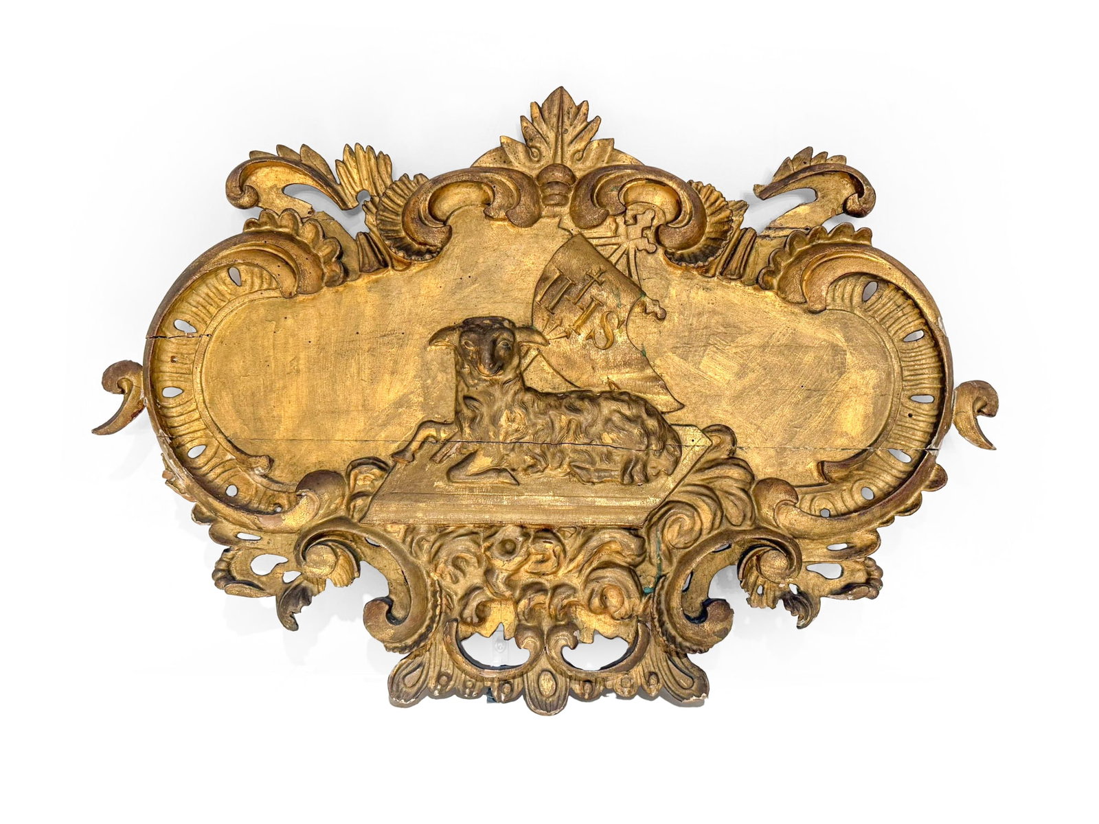 LAMB OF GOD, RELIEF CARVED FROM WOOD AND GILDED: Lamb of GodRelief carved from wood and gilded18th centuryHeight 54.5 cm, width 77 cm