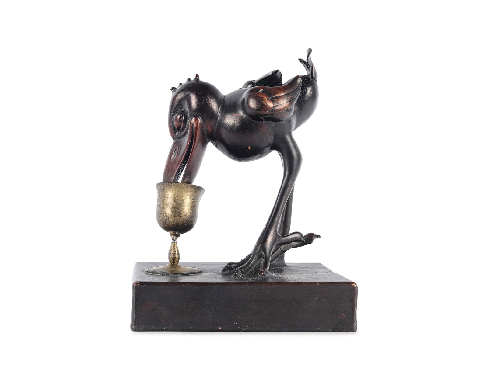 BRONZE FIGURE, HANS HUCKEBEIN WITH WINE GLASS: Bronze figureHans Huckebein with wine glassOne of Wilhelm Busch’s most famous charactersCast bronzeTotal height 17 cmGoblet broken