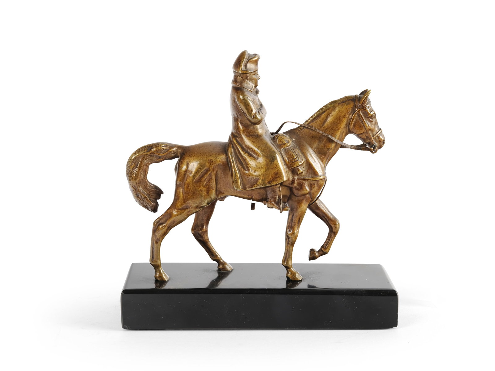 NAPOLEON ON HORSEBACK, CAST IN BRONZE: Napoleon on horsebackCast in bronzeMounted on a stone baseTotal height 13.5 cm, base length 13 cm