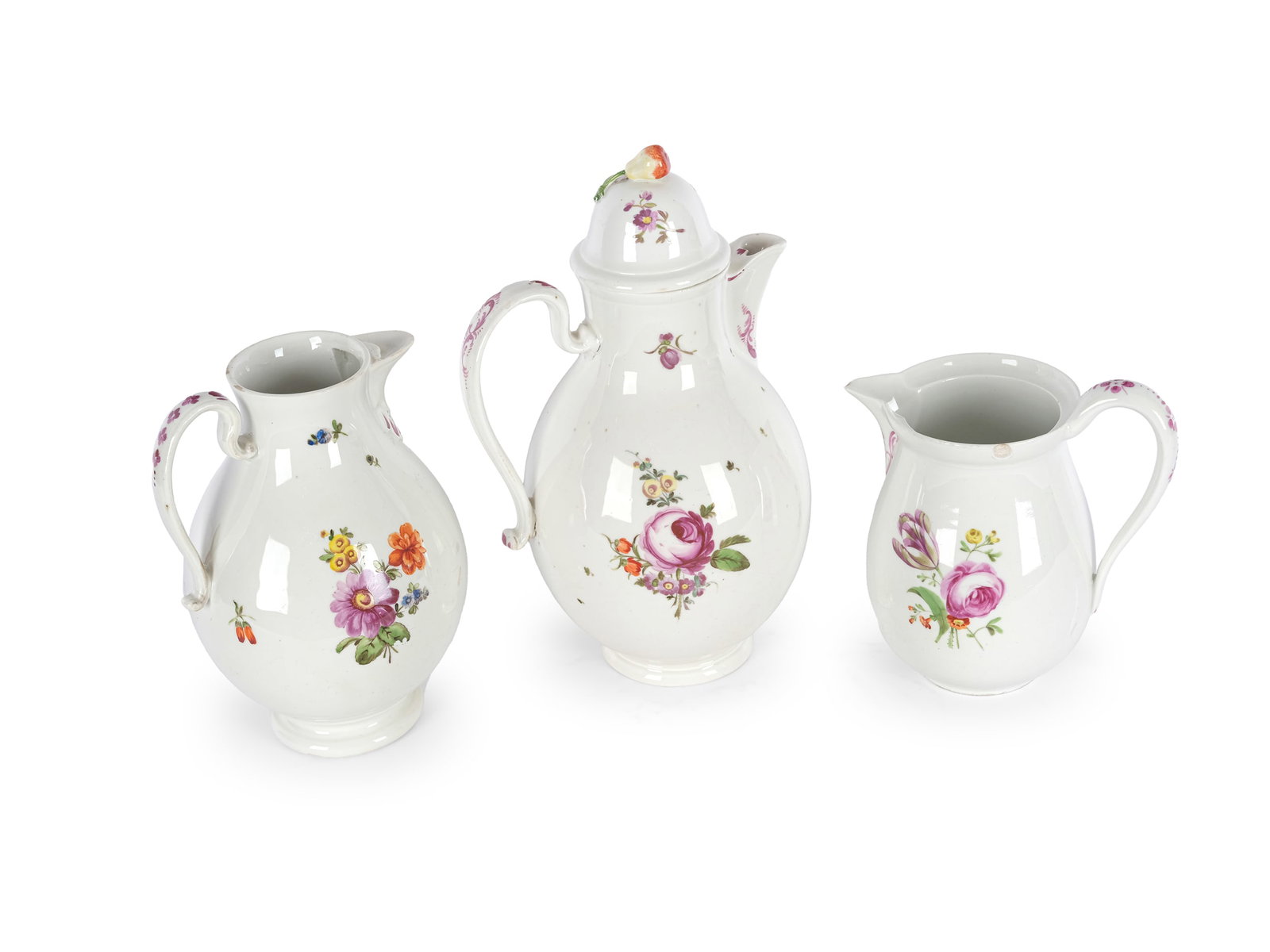 BUNDLE: OLD VIENNA PORCELAIN, LARGE COFFEE POT WITH LID and 2 MILK JUGS: Bundle: Old Vienna PorcelainLarge coffee pot with lid and 2 milk jugs18th/19th centuryWhite porcelain, colorfully decoratedCoffee pot height 25 cm, milk jugs height 15.5 cmMarked on the bottomChipped