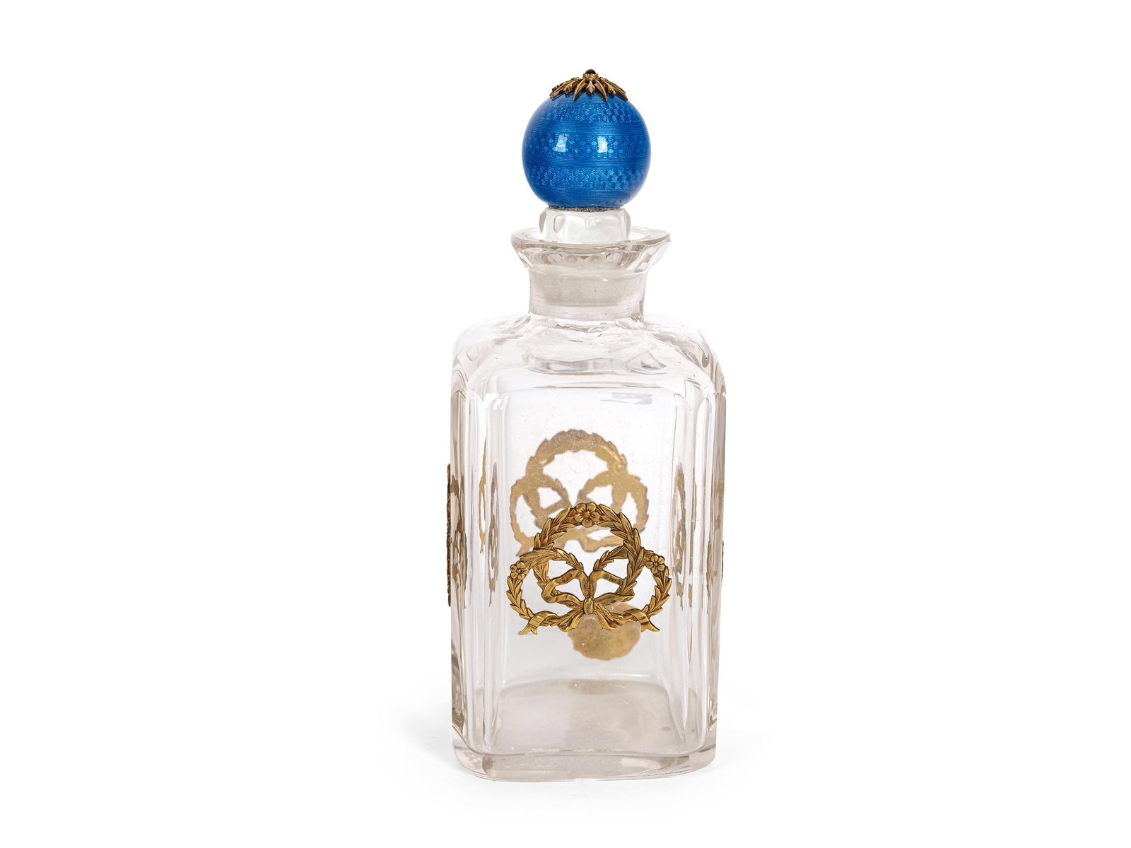 GLASS BOTTLE WITH BEVELED EDGES, CIRCUMFERENTIAL FLORAL RELIEFS IN GILT SILVER, MARKED (1 of 3)