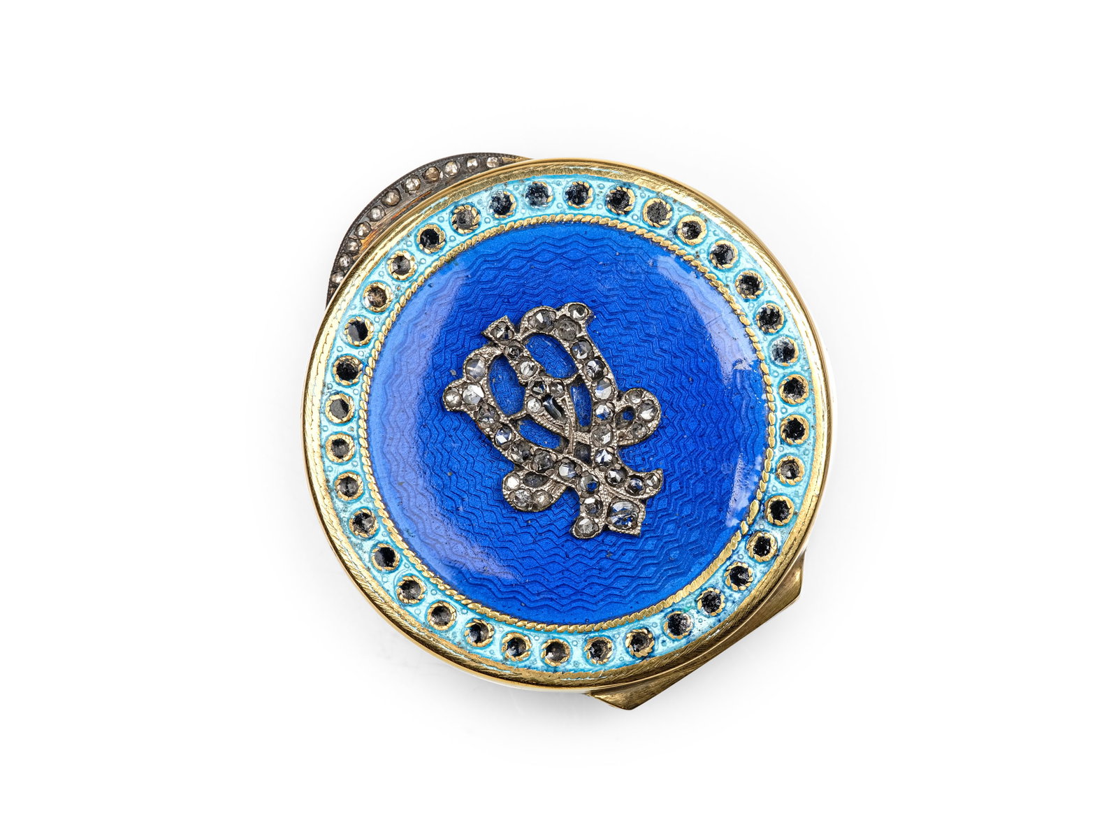 PILLBOX, RUSSIA, GILT SILVER: PillboxRussia, gilt silverHallmarked (88 Zolotniki)Lid: enamel with silver monogram in reliefDiamond-setMonogram of Maria FeodorovnaDiameter 3.6 cmWeight 30.4 g