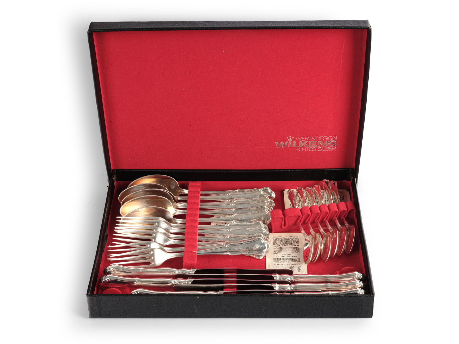 TABLEWARE, WILKENS: TablewareWilkensConsisting of:6 spoons6 forks6 knives6 dessert spoonsSilver hallmarked, steel bladesWeight of spoons: 390 gWeight of forks: 330 gWeight of knives: 500 gWeight of dessert spoons: 139