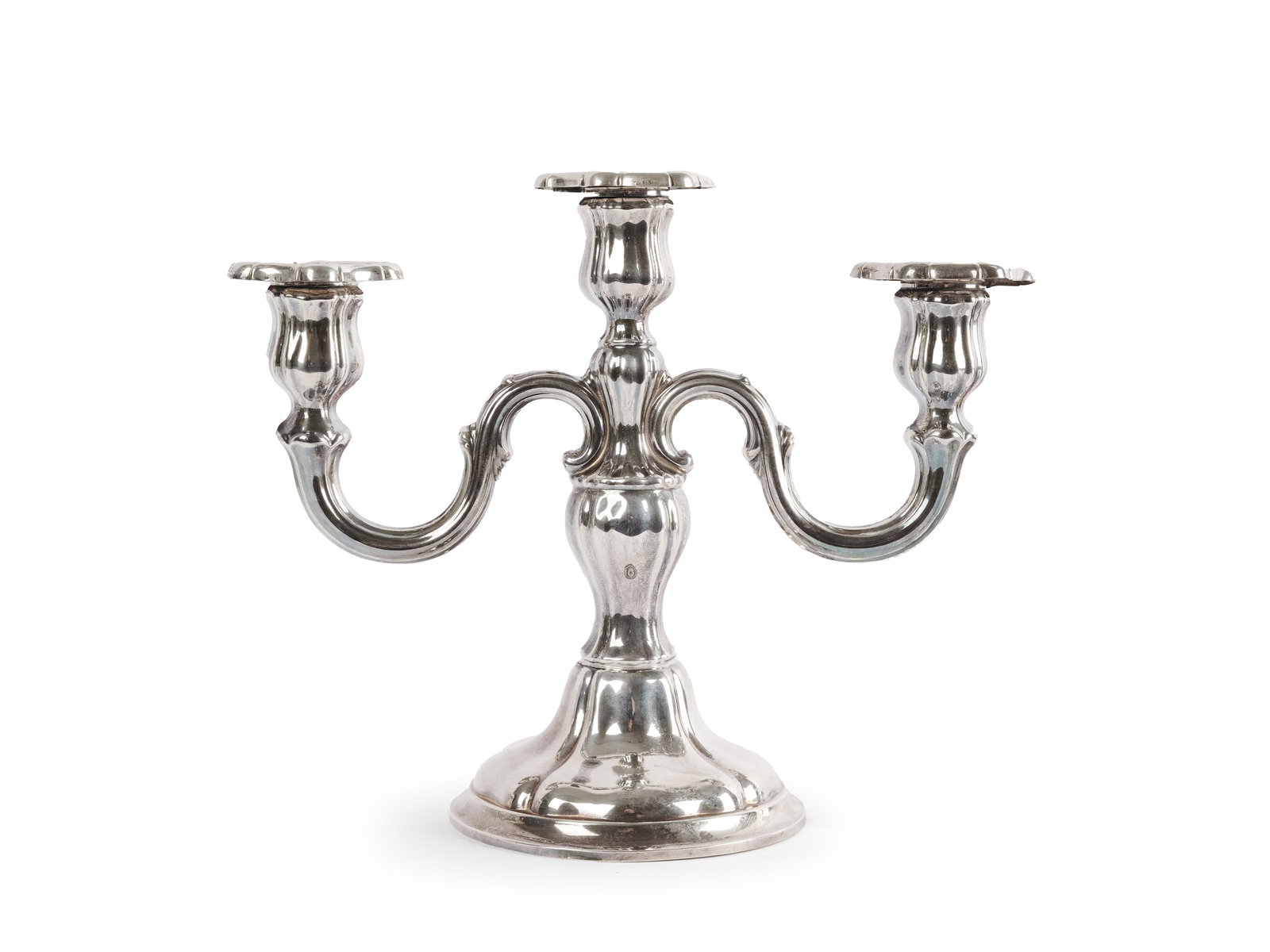 CANDLESTICK, THREE-ARMED: CandlestickThree-armedHallmarked silverHeight 23.5 cm, width 29 cmWeight 720 g including weighted base