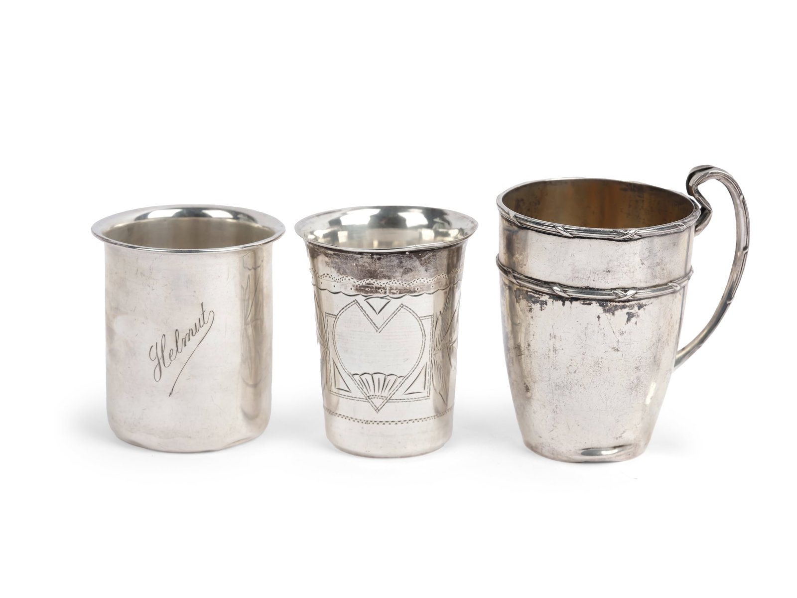 2 SILVER CUPS AND 1 HANDLED CUP WITH DENTS ALL AROUND THE BASE (1 of 1)