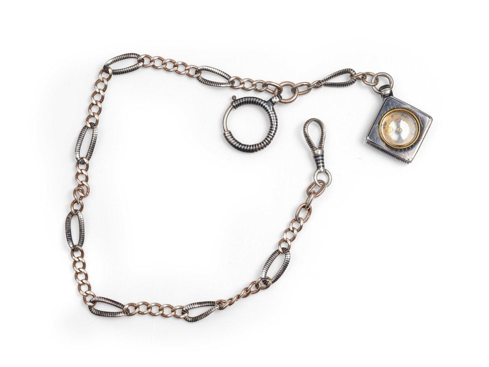 WATCH CHAIN WITH COMPASS, TULA SILVER AND PARTIALLY GILT: Watch chain with compassTula silver and partially giltLength 35 cmWeight 23.8 g