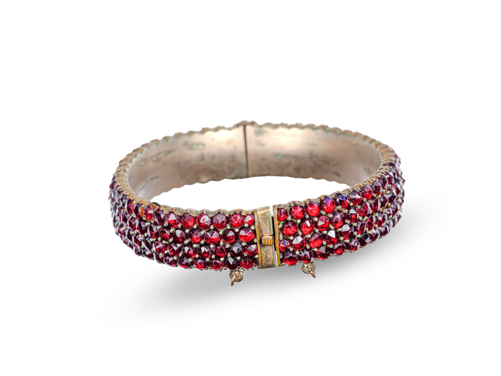 GARNET BANGLE, CIRCA 1900 - 2