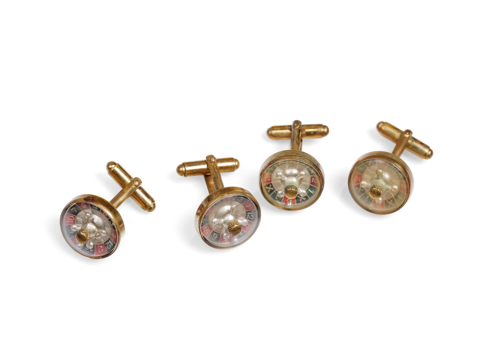 TWO PAIRS OF CUFFLINKS, GILT BRASS: Two pairs of cufflinksGilt brassRouletteDiameter 1.8 cmWeight 28 gGold plating worn