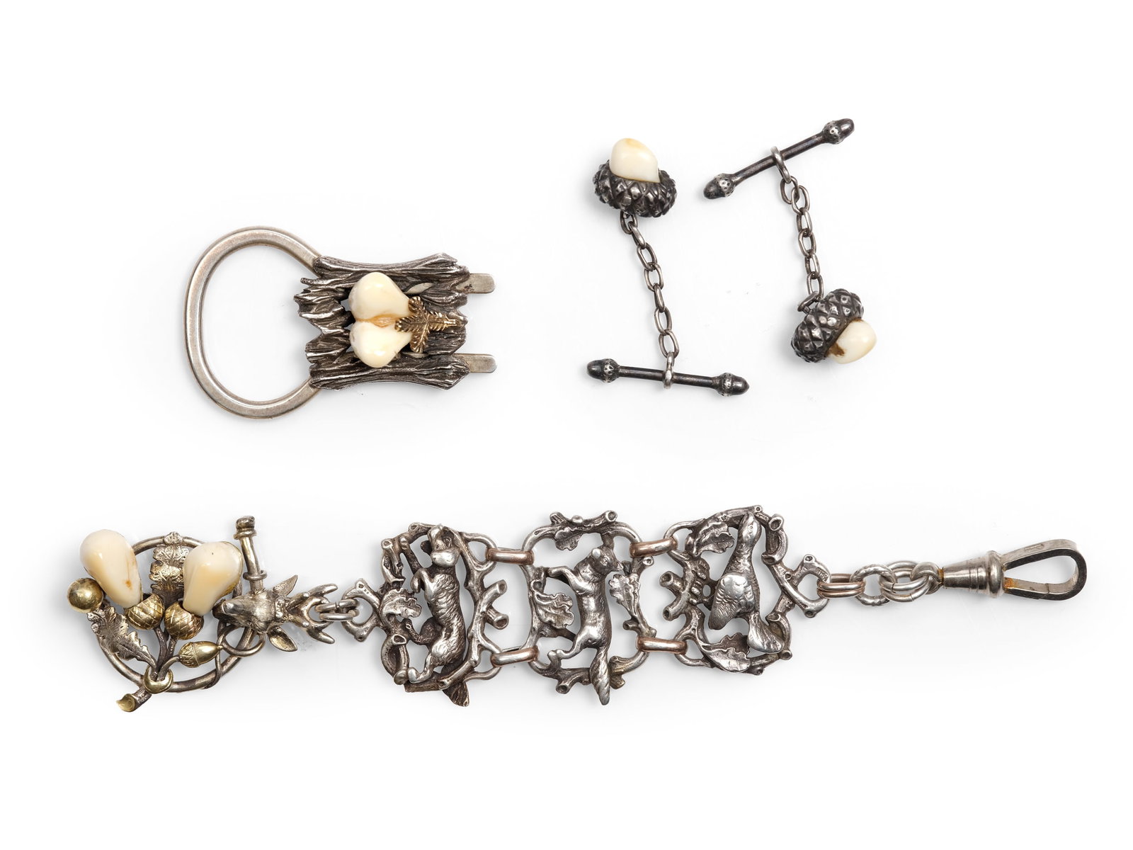 TRADITIONAL COSTUME JEWELRY SET:, CUFFLINKS WITH GRANDEL: Traditional costume jewelry set:Cufflinks with grandelKeychain with grandel andchatelierPartially giltChatelier length 14.5 cmTotal weight 55.3 g