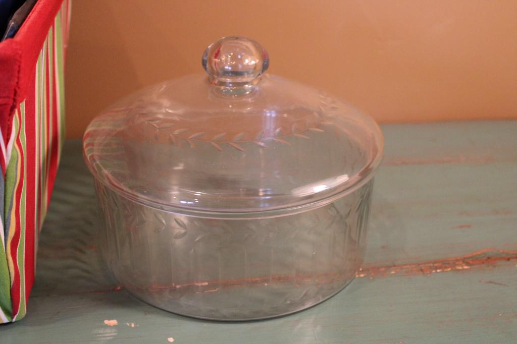 Decor Basket with Covered Glass Candy Dish: Decor basket with books and covered glass candy dish