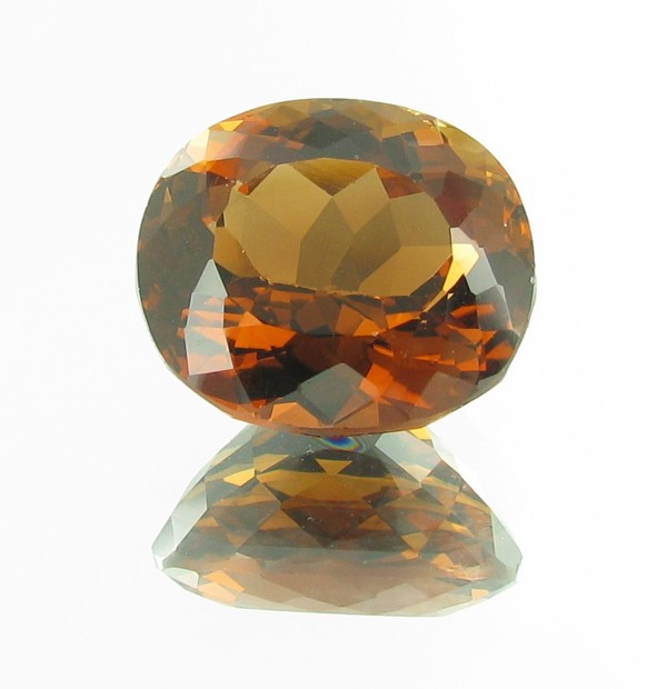 21.95ct Imperial Topaz Appraised $98k: Excellent clear cognac red/orange colored specimen oval cut; lab quality evaluation 10; no treatment noted; Gem Guide wholesale $16463-$21950; full retail appraisal $97888; full lab evaluation include