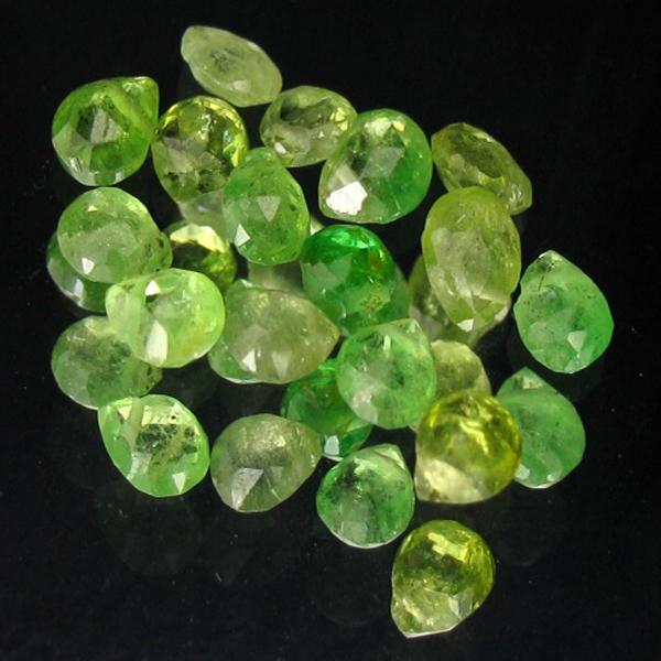 5ct Yellow Green Tsavorite Garnet Appraised $11k: Excellent yellow green colored parcel 15 pieces mixed cut; lab quality evaluation 5; treatment as noted; Gem Guide wholesale $1500-$2500; full retail appraisal $10518; full lab evaluation available